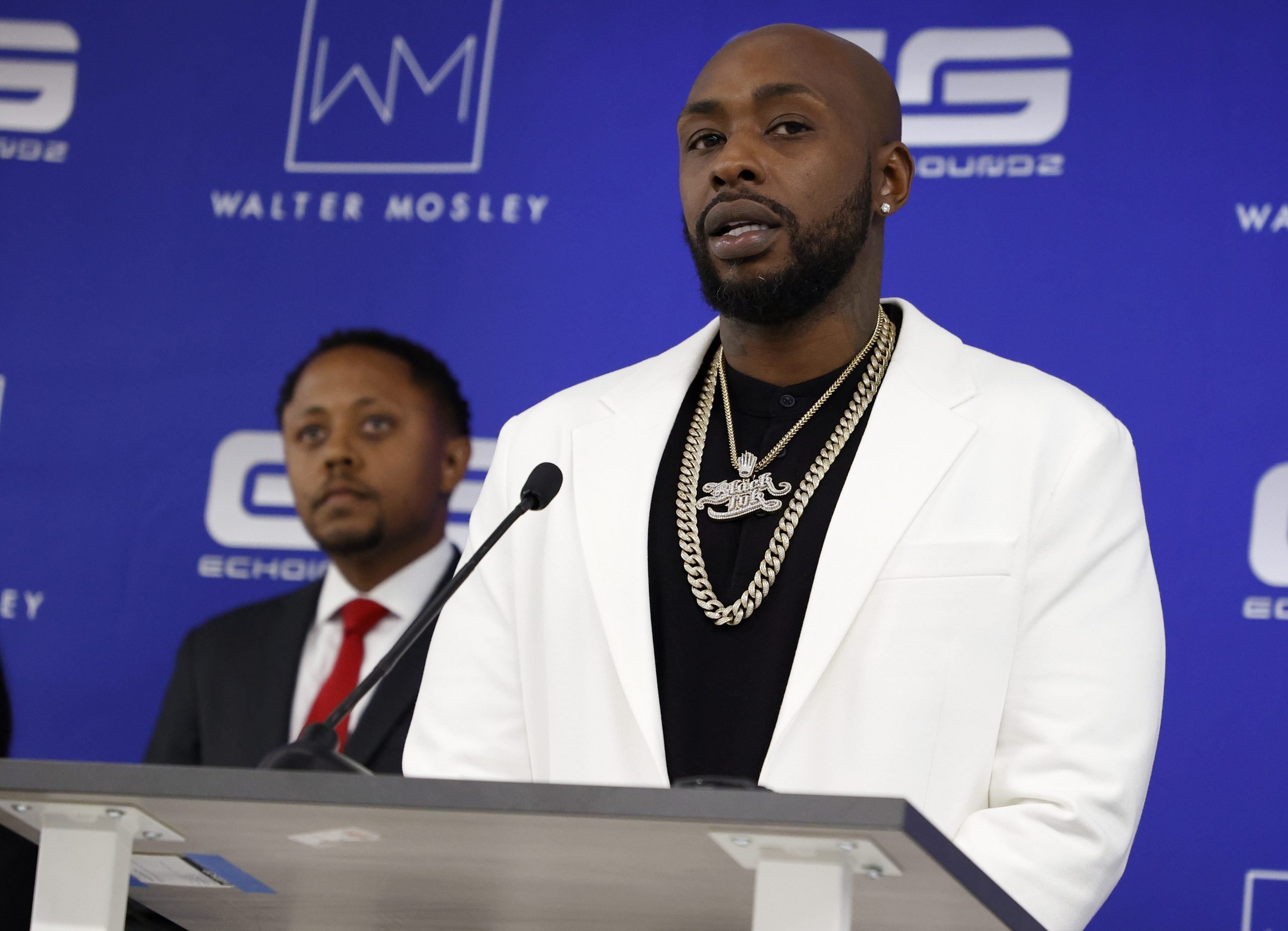 Lawyer Walter Mosley and 'Black Ink Crew' star Ceaser Emanuel standing next to each other at a press conference