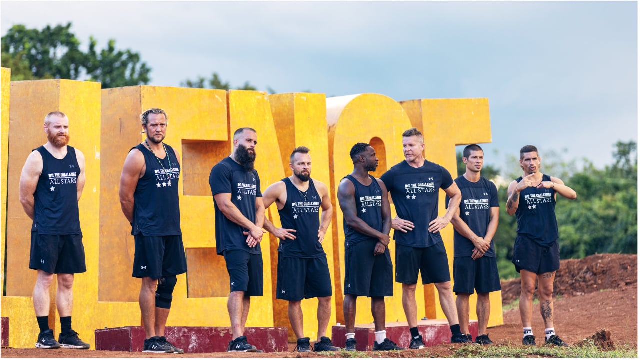 'The Challenge: All Stars' cast Wes Bergmann, MJ Garrett, Brad Fiorenza, Derrick Kosinski, Nehemiah Clark, Mark Long, Yes Duffy, and Jordan Wiseley standing next to each other, waiting for a challenge