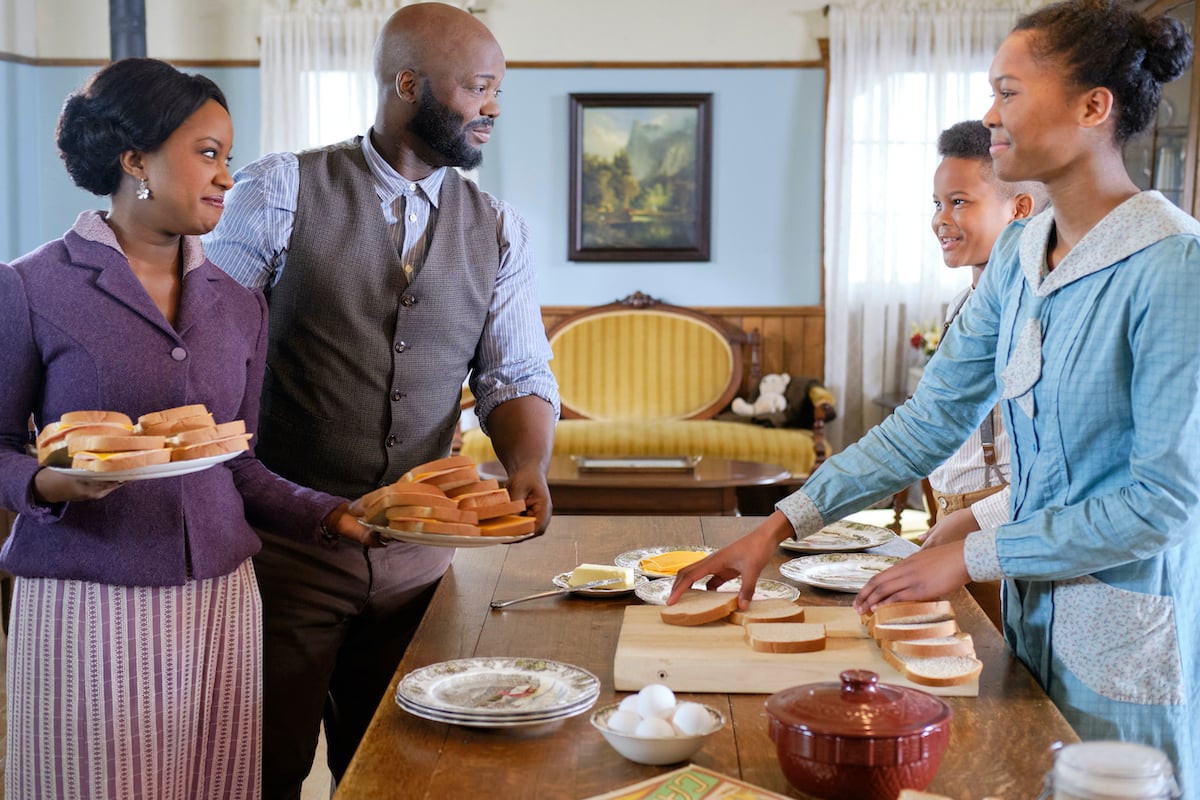 Members of the Canfield family standing around a kitchen table in season 9 of the Hallmark Channel series 'When Calls the Heart'