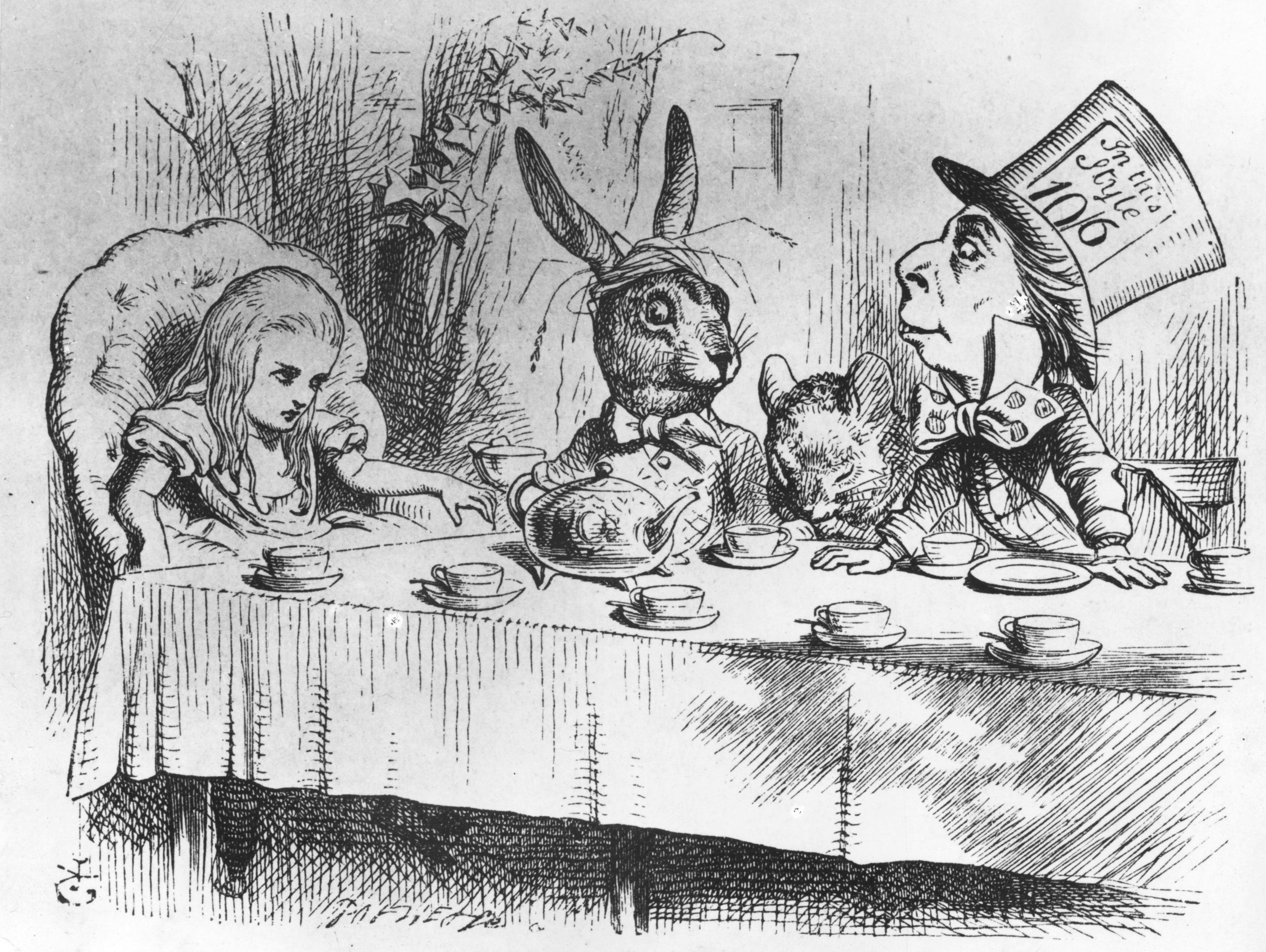 Alice, the March Hare, the Dormouse and the Mad Hatter from 'Alice in Wonderland' at a table