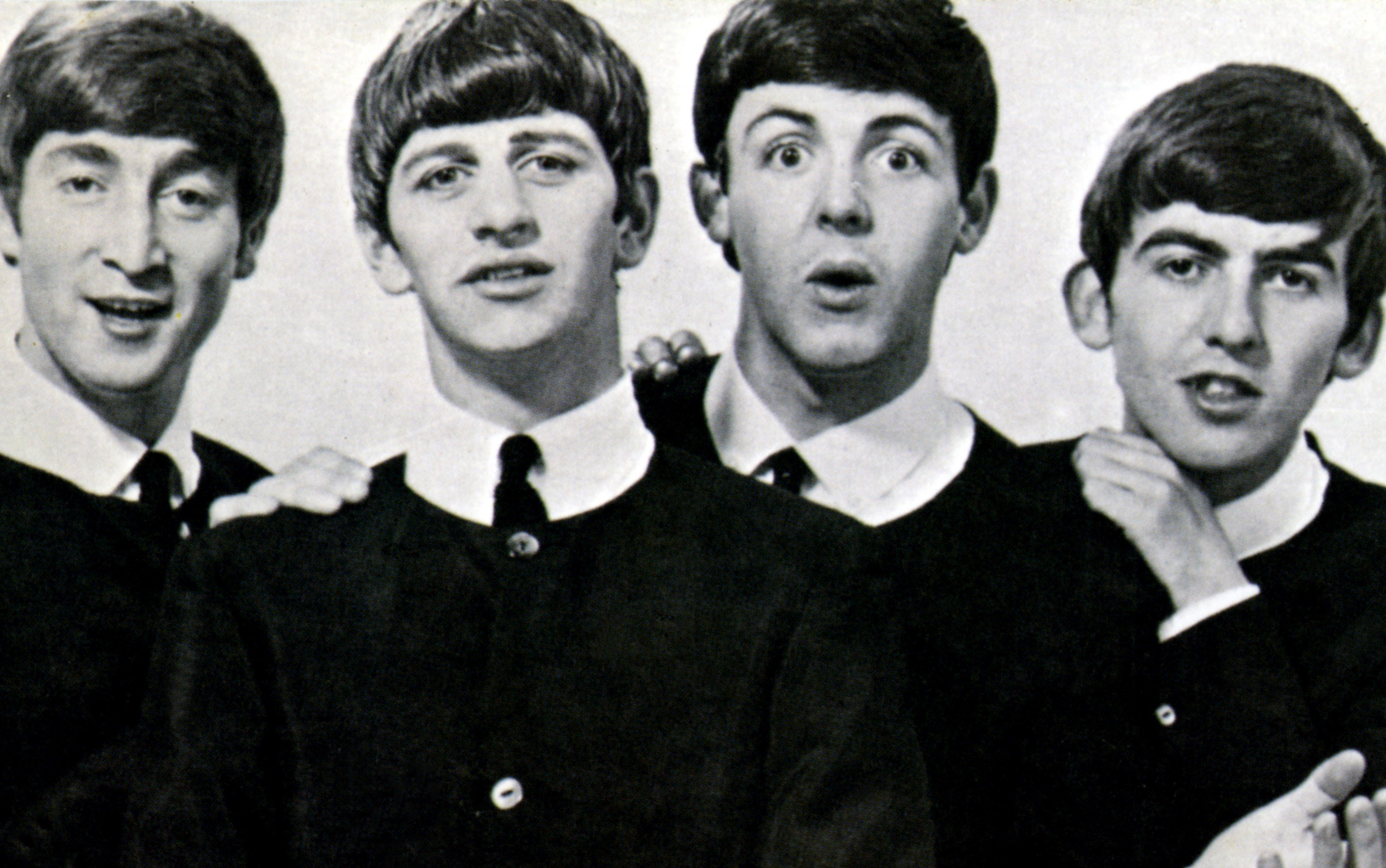 The Beatles' John Lennon, Ringo Starr, Paul McCartney, and George Harrison dressed identically during the "Paperback Writer" era