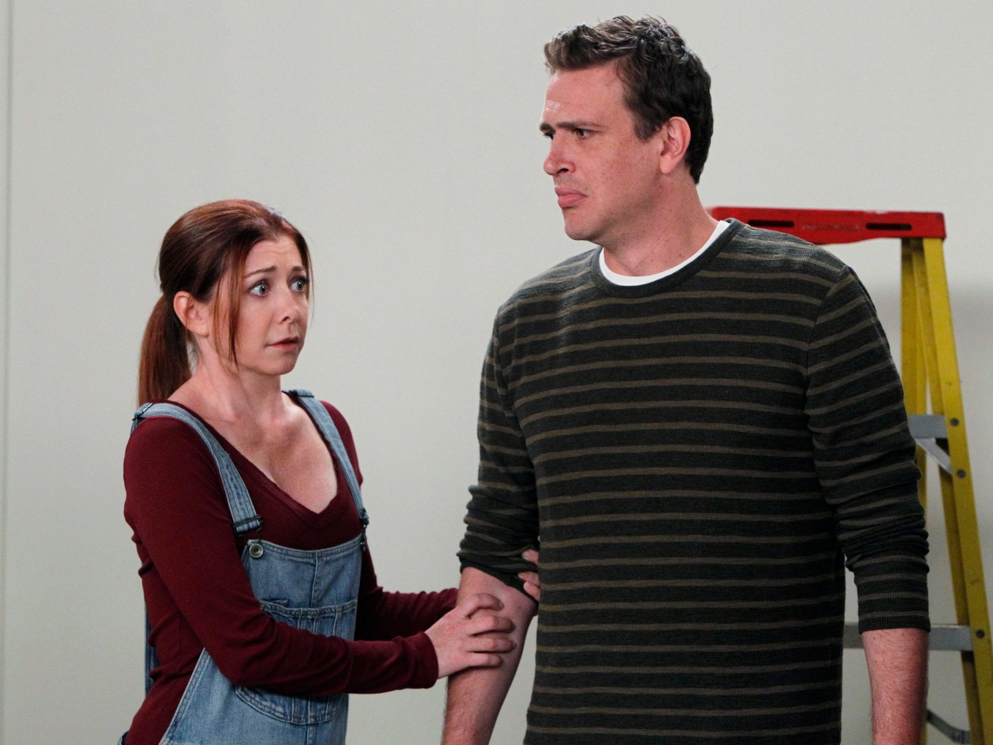 Lily (Alyson Hannigan) and Marshall (Jason Segel) look shocked in an episode of 'How I Met Your Mother'