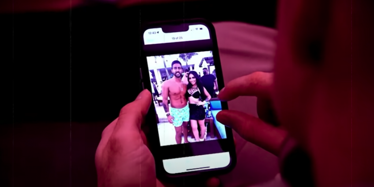 An image of Luis 'Potro' Caballero and Angelina Pivarnick on Mike 'The Situation' Sorrentino's cell phone in 'Jersey Shore: Family Vacation' Season 5B