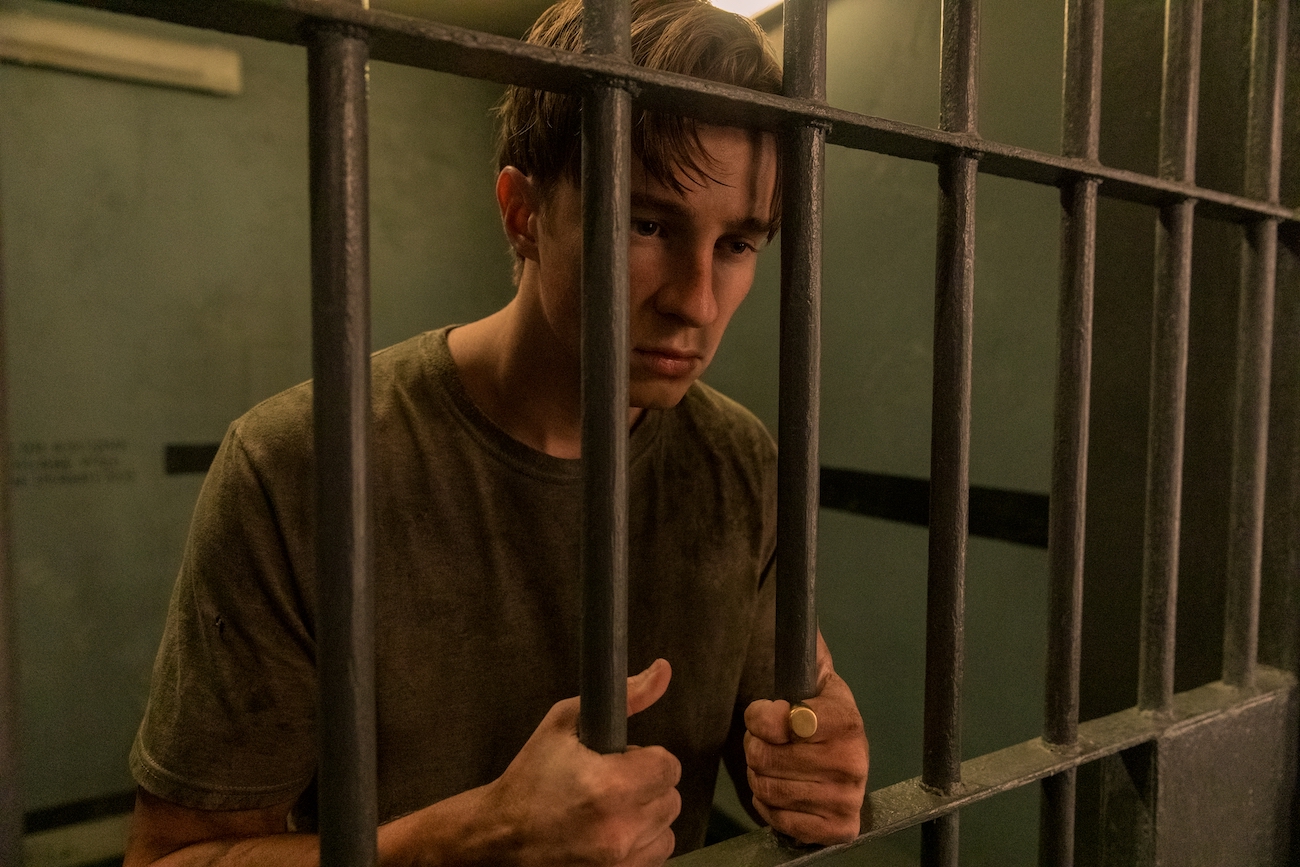 Rafe Cameron (Drew Starkey) in a jail cell in 'Outer Banks' Season 2