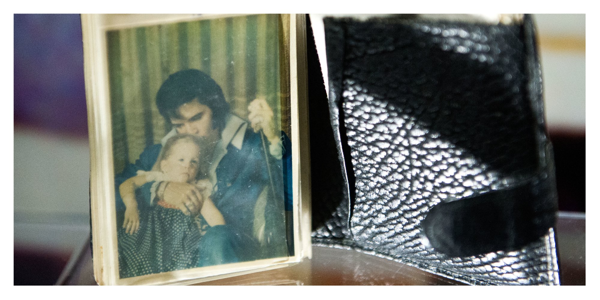 Elvis Presley and Lisa Marie Presley in a photograph seen in Elvis' wallet at Graceland.
