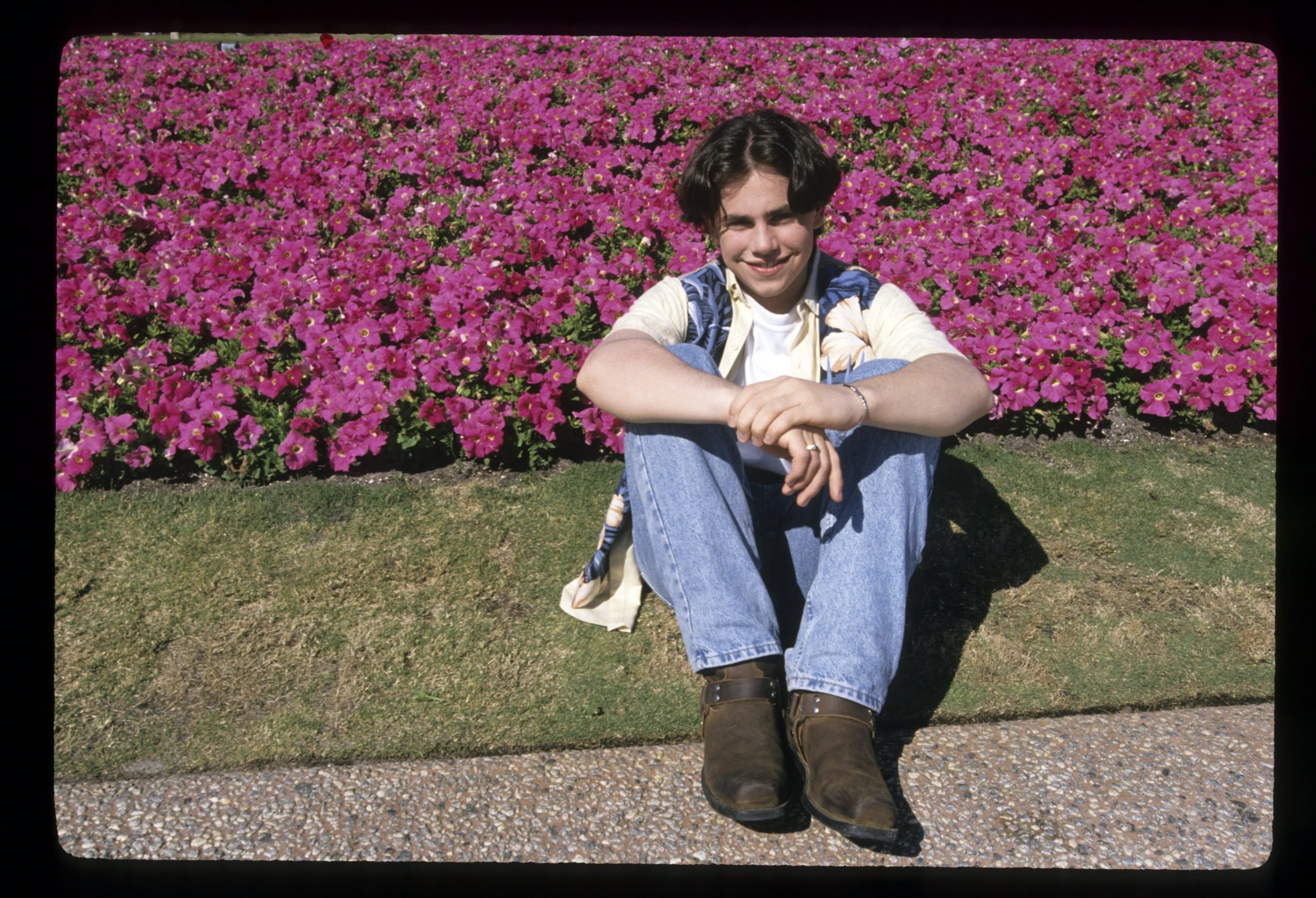 Rider Strong poses for a photo while filming an episode of 'Boy Meets World'