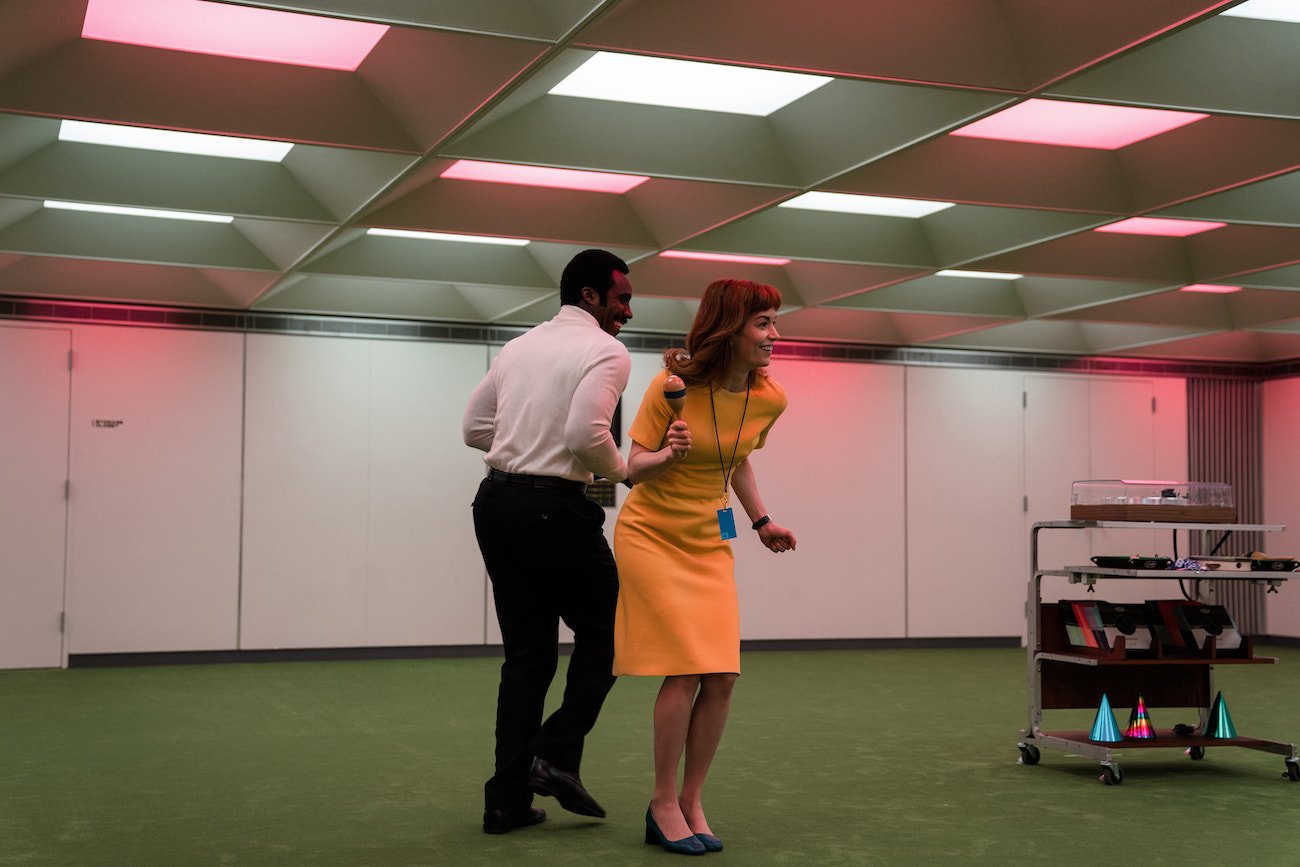 Milchick (Tramell Tillman) and Helly (Britt Lower) dance in the MDR offices of Lumon, just one of the incentives the company offers in 'Severance' on Apple TV+