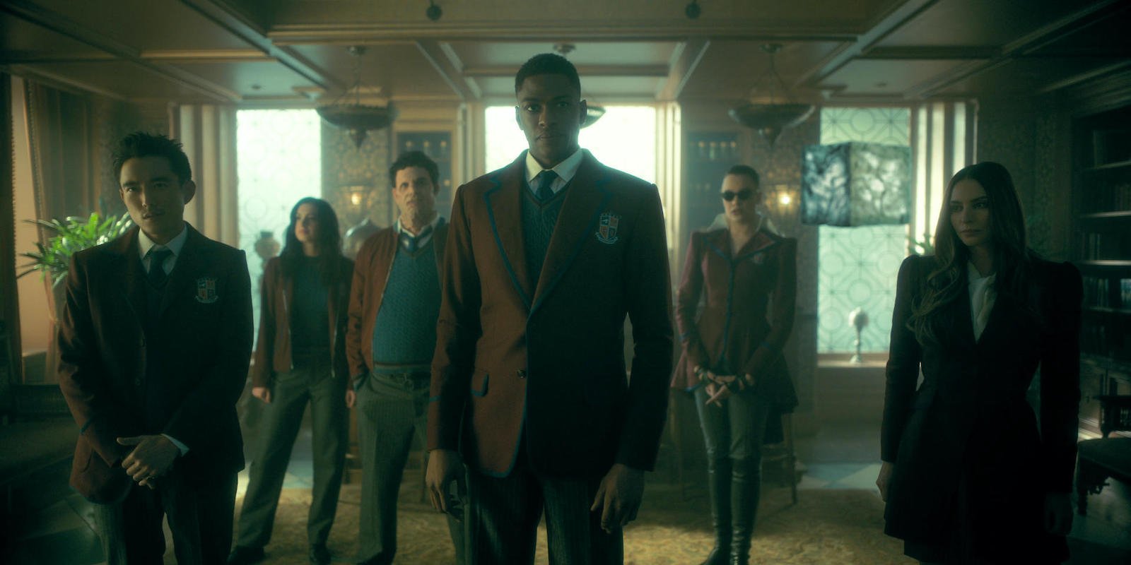 Ben Hargreeves (Justin H. Min), Jayme (Cazzie David), Alphonso (Jake Epstein), Marcus (Justin Cornwell), Fei (Britne Oldford), Christopher the Green Cube, and Sloane (Genesis Rodriguez) in the Sparrow Academy mansion in 'The Umbrella Academy' Season 3