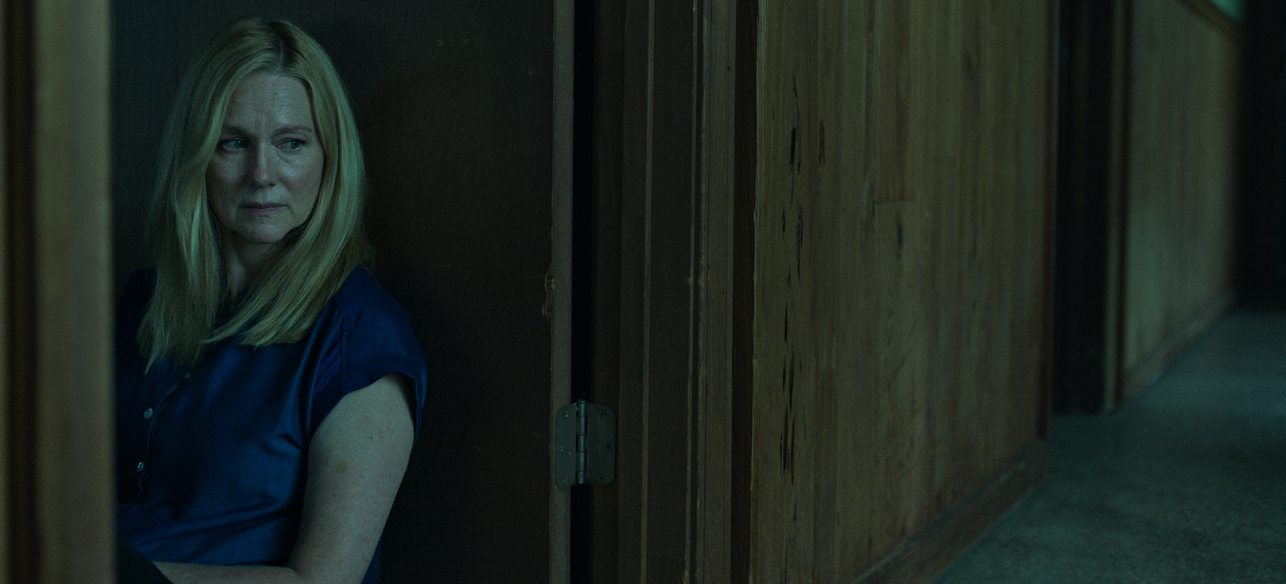 Wendy Byrde (Laura Linney) leans against a bedroom door in her home in 'Ozark' Season 4 Part 2