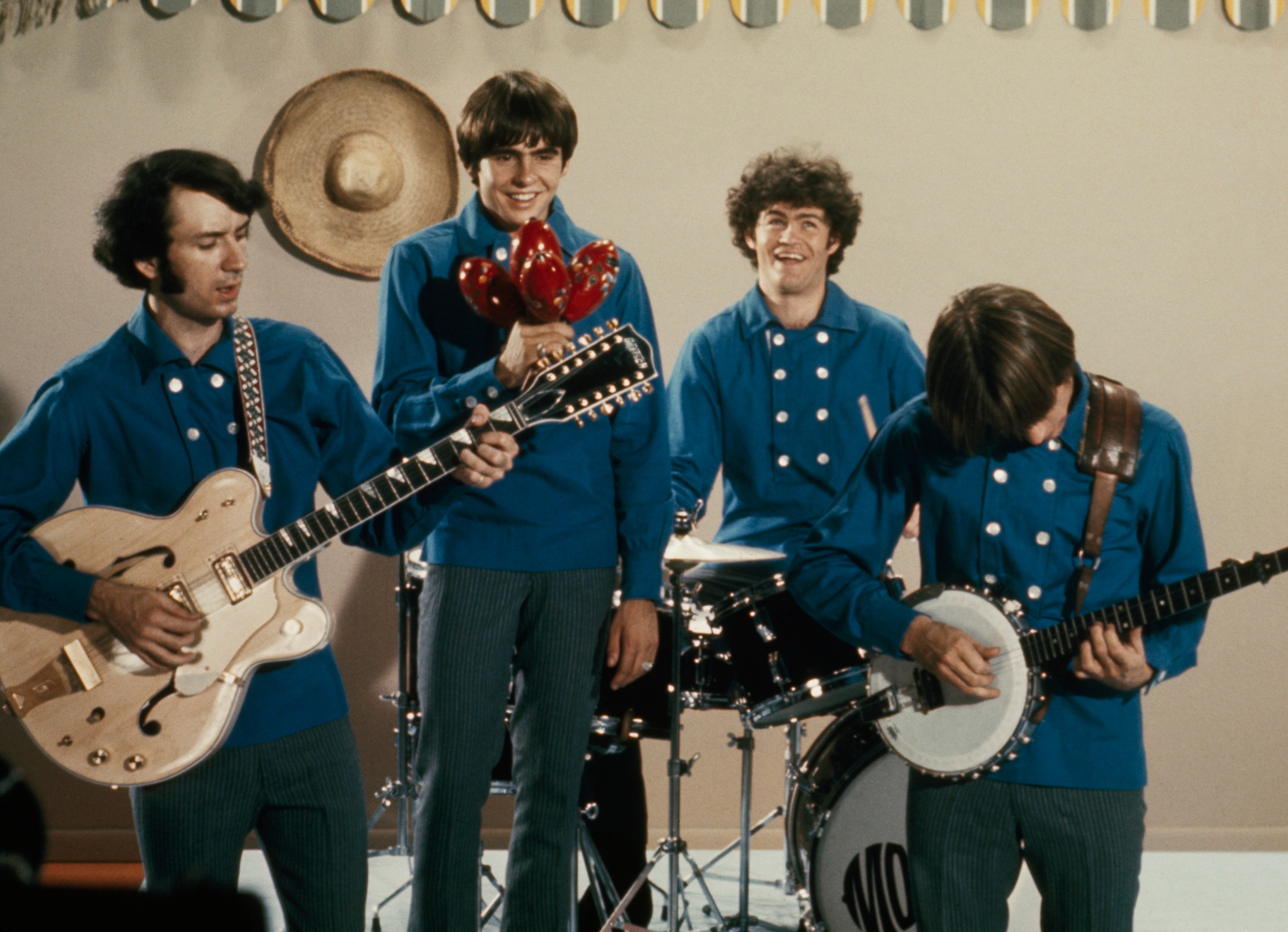 The Monkees' Michael Nesmith, Davy Jones, Micky Dolenz, Peter Tork playing songs