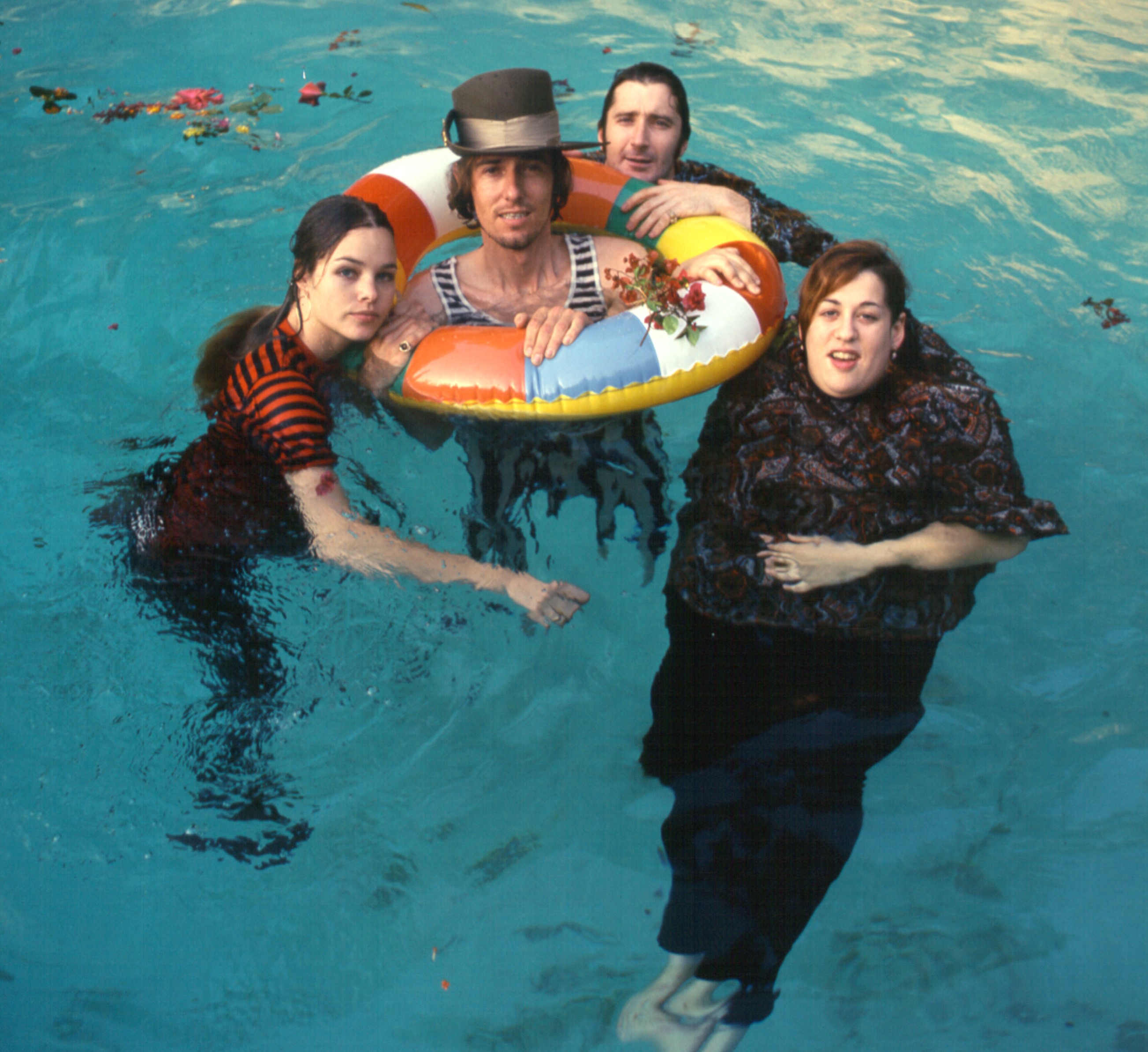 The Mamas & the Papas in a pool