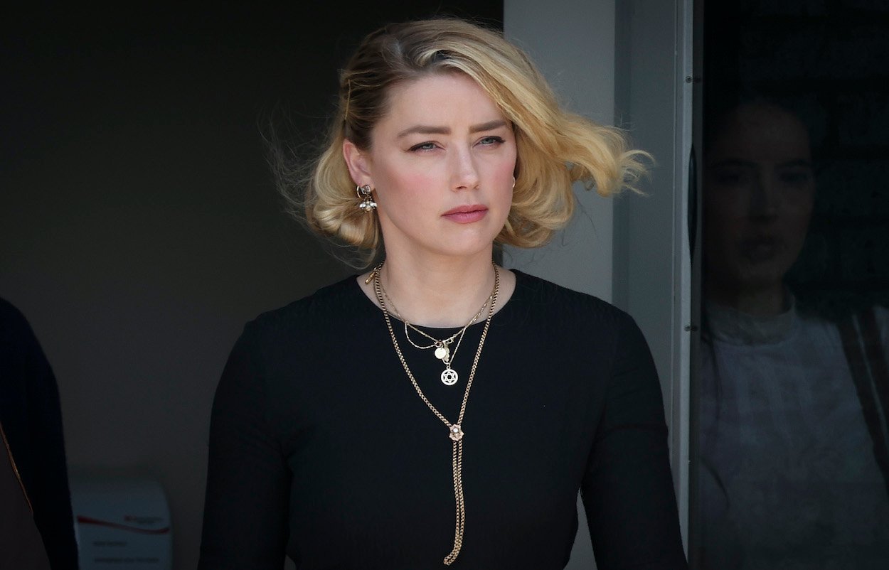 Amber Heard departs county courthouse in Fairfax, Virginia, on June 1, 2022. Heard's trial vs. Johnny Depp went against her, and now she wants the verdict to be thrown out.
