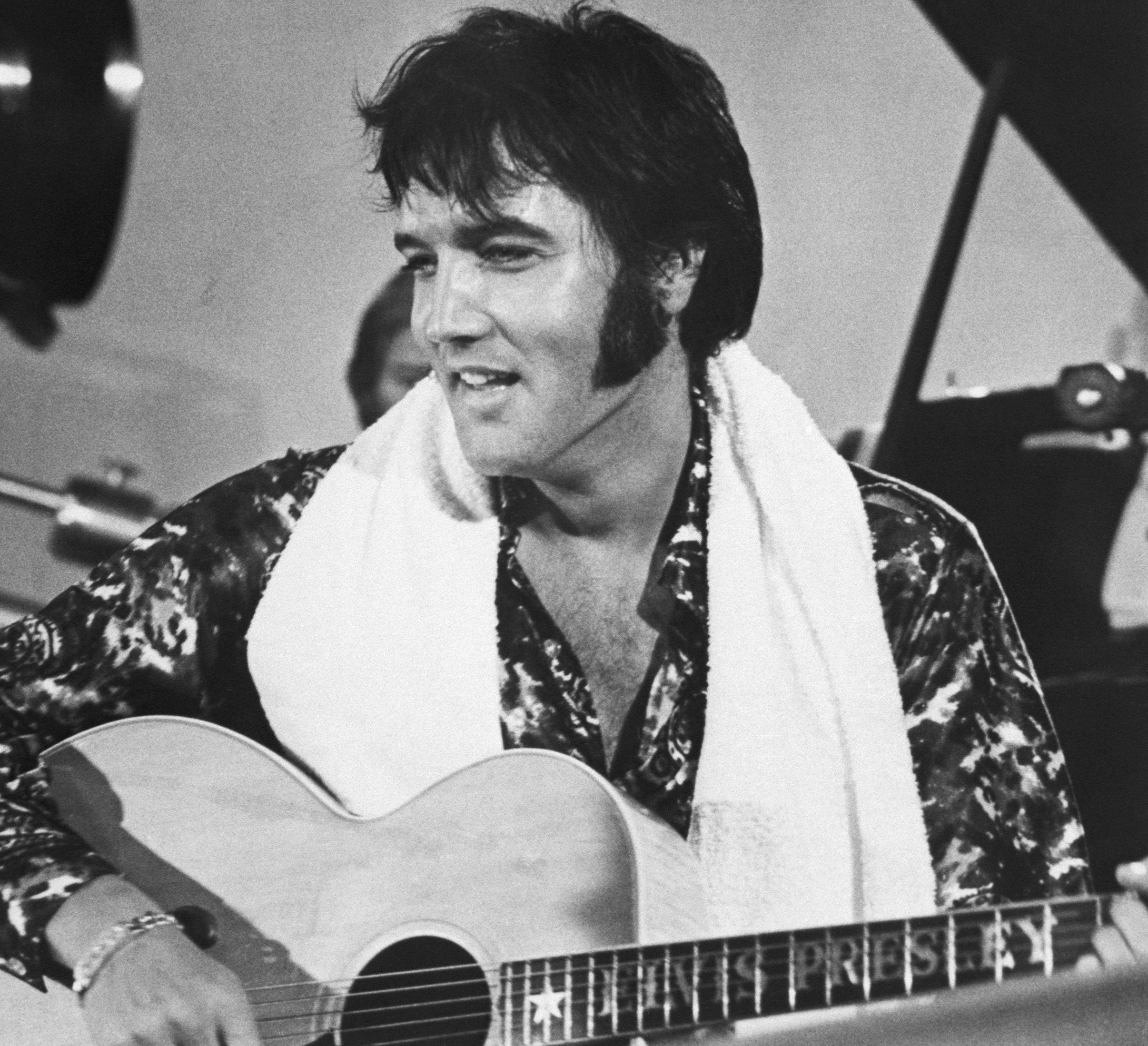 Elvis Presley with a guitar