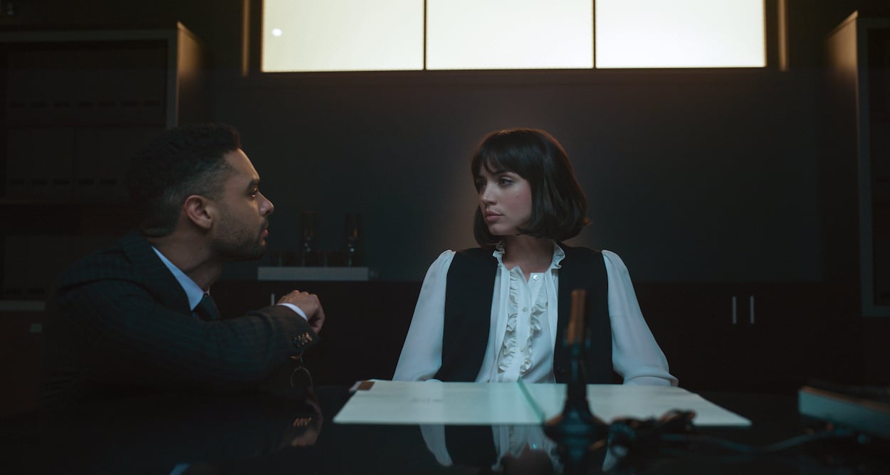 Regé-Jean Page (left) and Ana de Armas in Netflix's 'The Gray Man.' de Armas reunited with Ryan Gosling and Chris Evans in the movie, but what she loved best was playing a strong character.