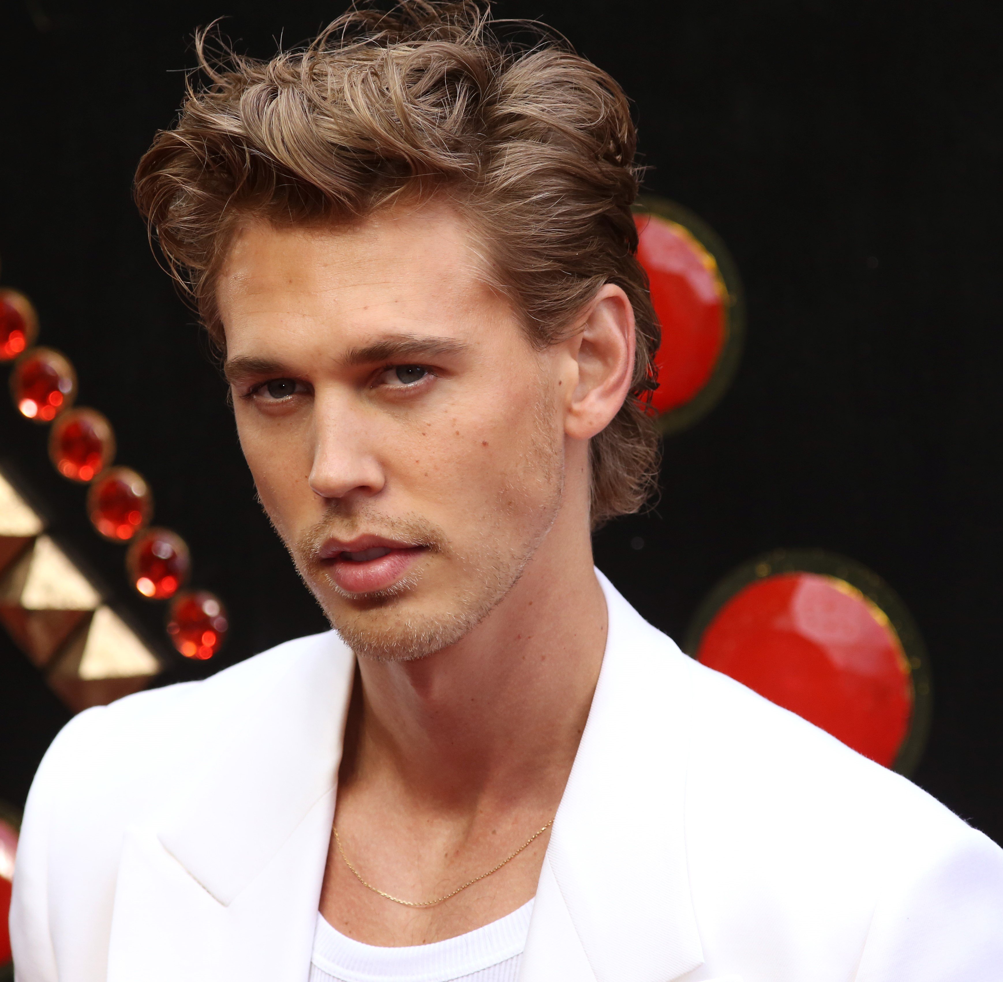 'Elvis' star Austin Butler wearing a white suit