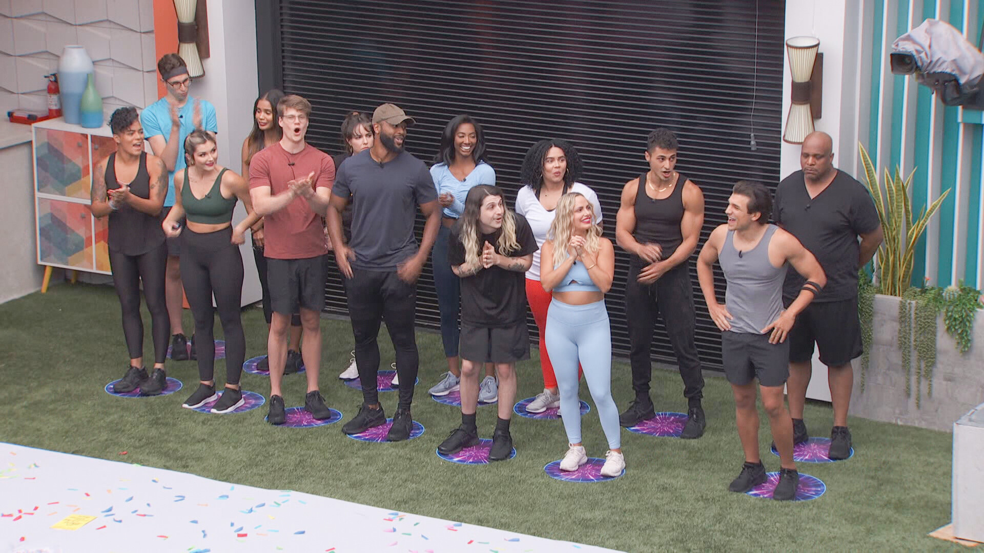 Big Brother 24 cast standing outside in the backyard