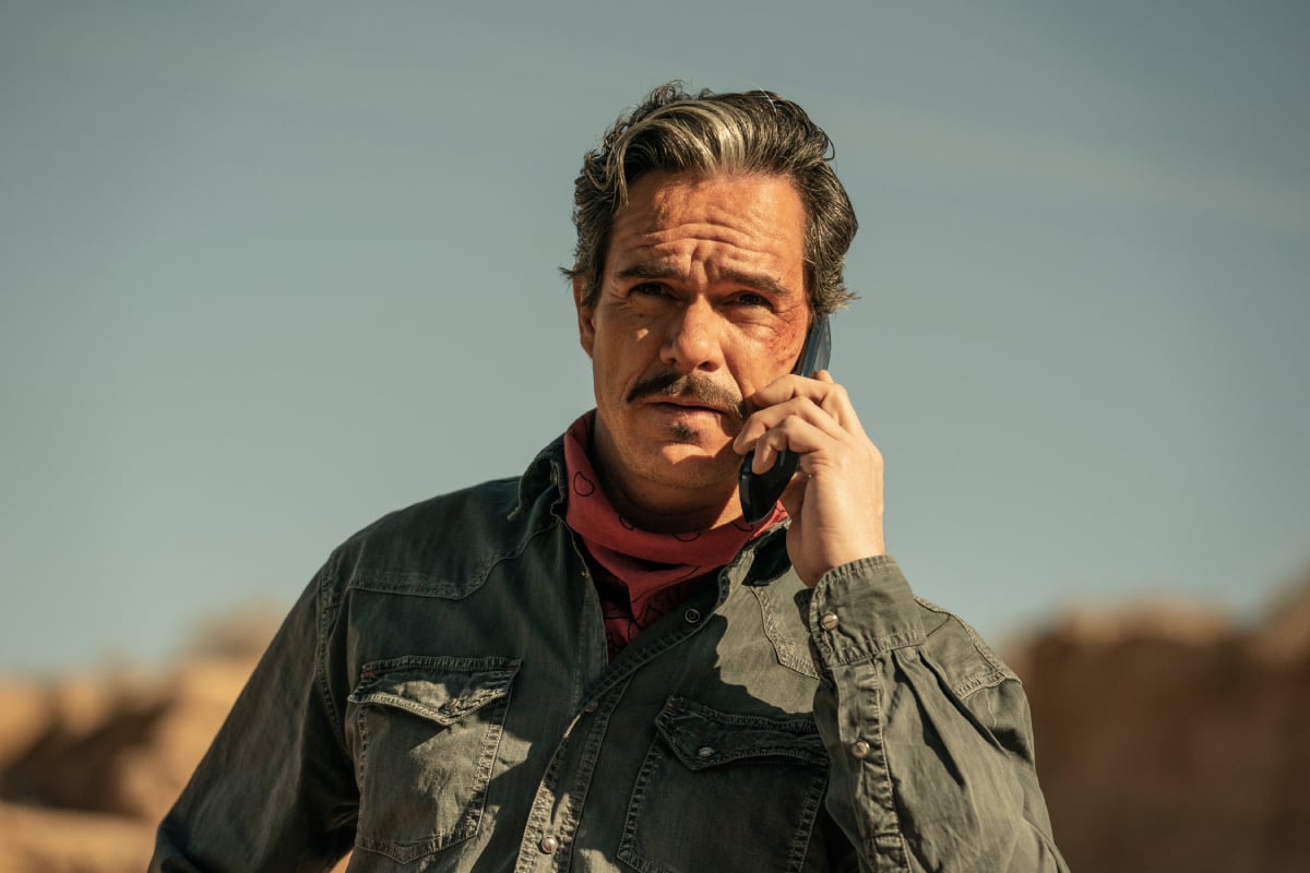 Tony Dalton as Lalo Salamanca in Better Call Saul Season 6. Lalo talks on the phone in the desert. 
