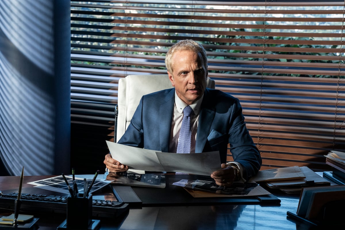 'Better Call Saul' Season 6: Howard Hamlin (Patrick Fabian) sits at his desk reading documents