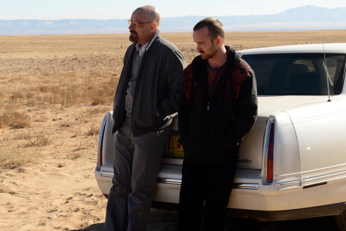 Walt and Jesse will appear in Better Call Saul. The characters lean against Saul Goodman's car. 