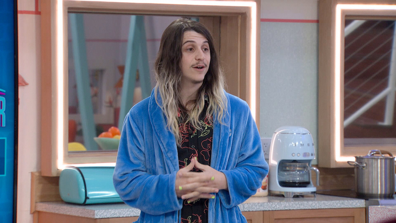 Matthew Turner stands in a robe in the kitchen on 'Big Brother 24'.