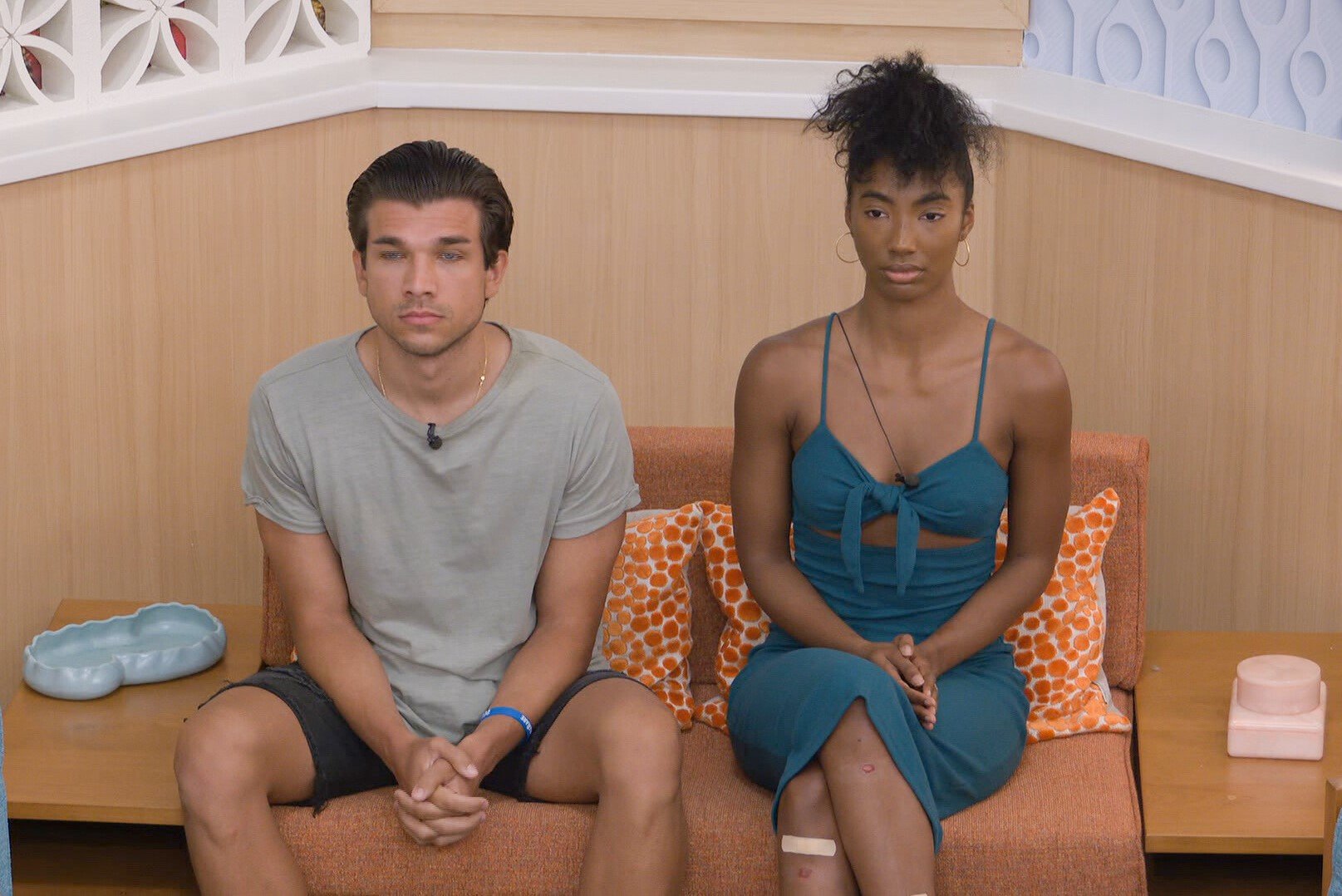 Joe 'Pooch' Pucciarelli and Taylor Hale sit in the nomination chair in the Big Brother house. Pooch wears a light gray shirt over dark gray pants. Taylor wears a teal dress. Does a new episode of 'Big Brother 24' air tonight, July 21?