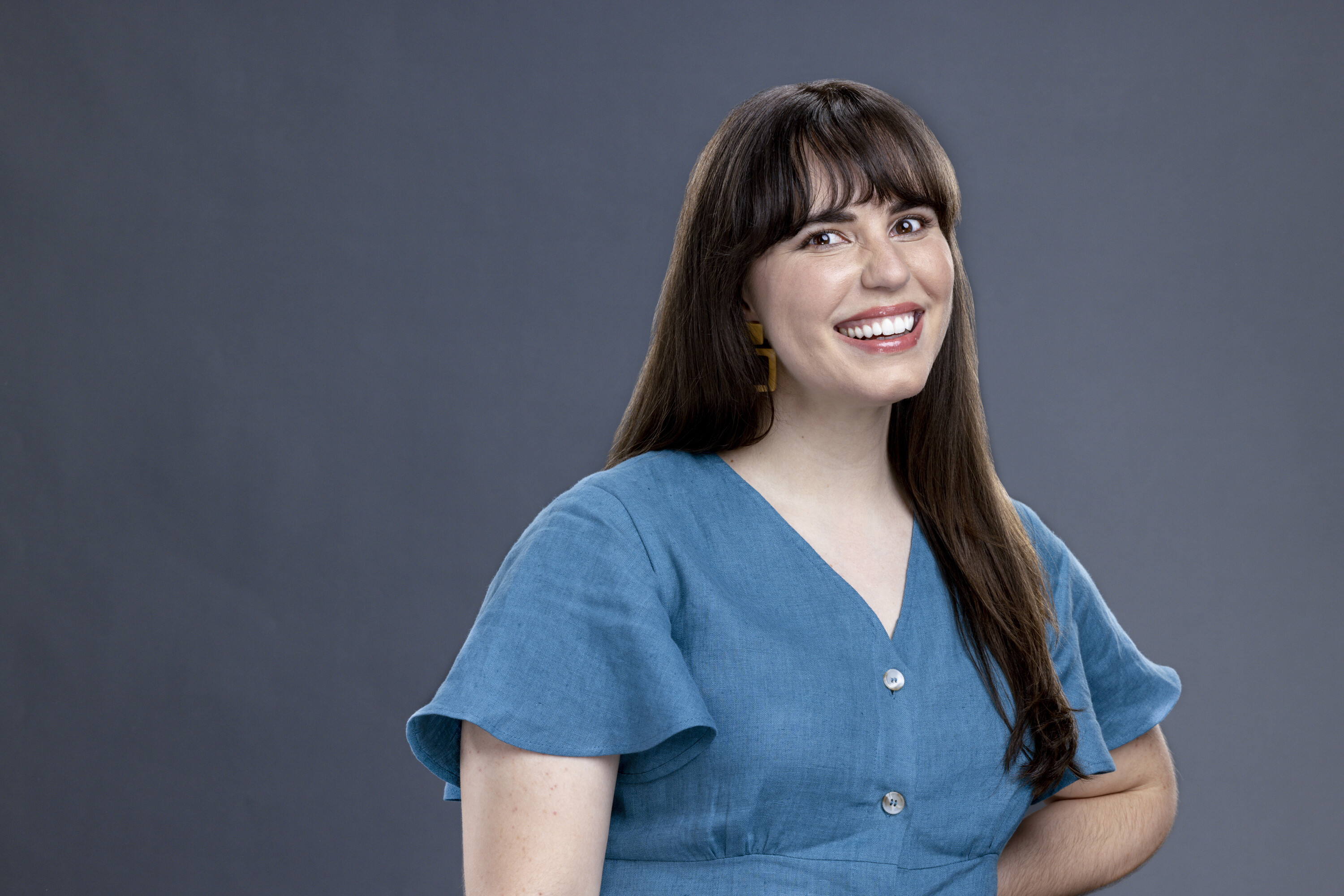 Brittany Hoopes, who is a houseguest on 'Big Brother' Season 24, wears a blue dress.