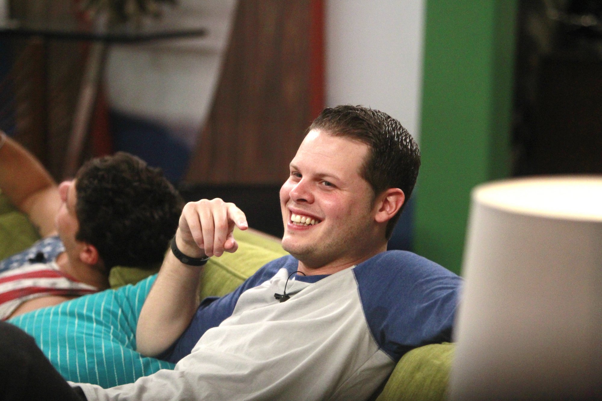 Derrick Levasseur, who is one of the 'Big Brother' winners, wears a blue and white baseball shirt.
