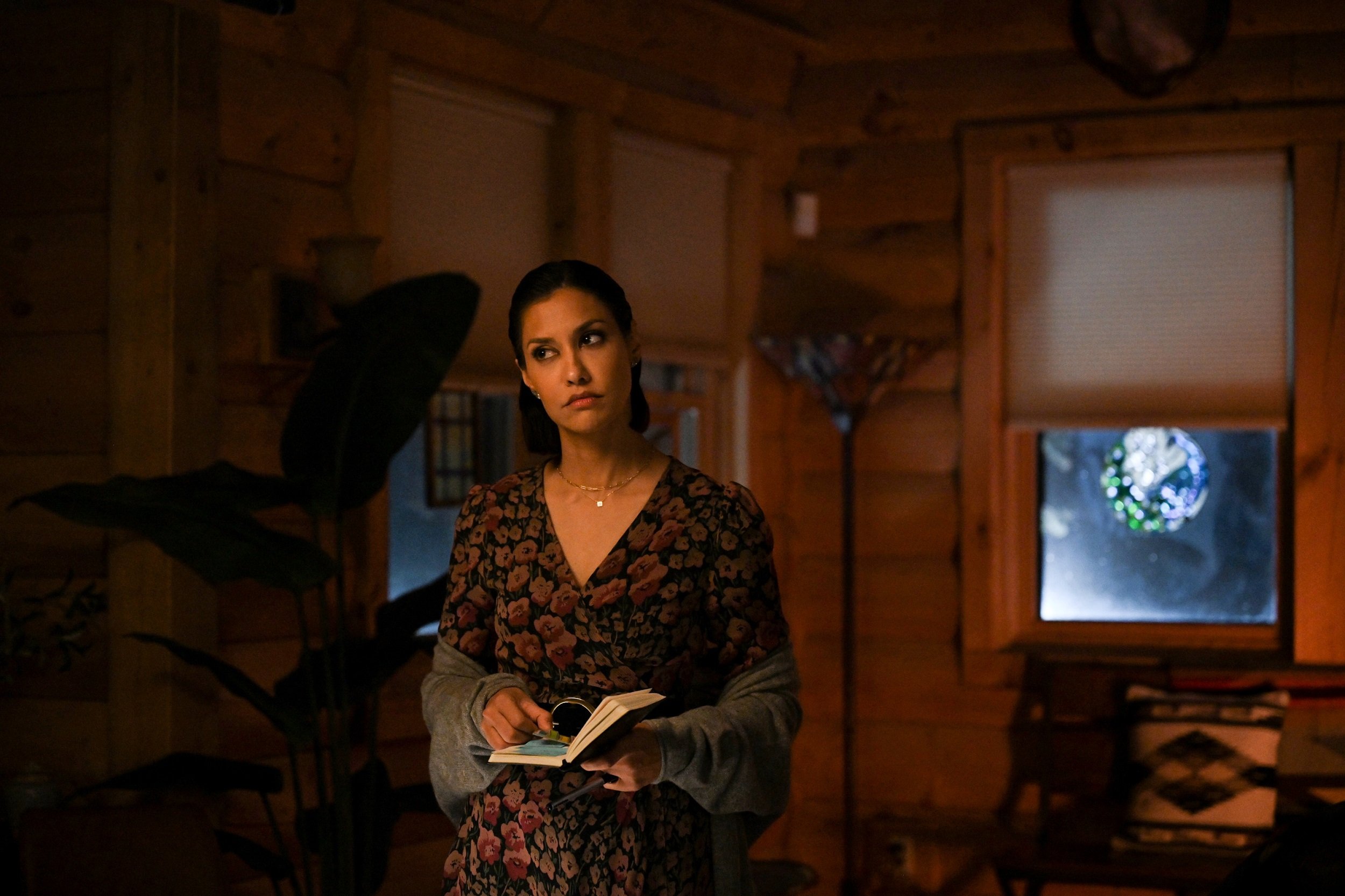 'Big Sky' Season 2: Janina Gavankar looks puzzled with a book in her hand as Ren Bhullar