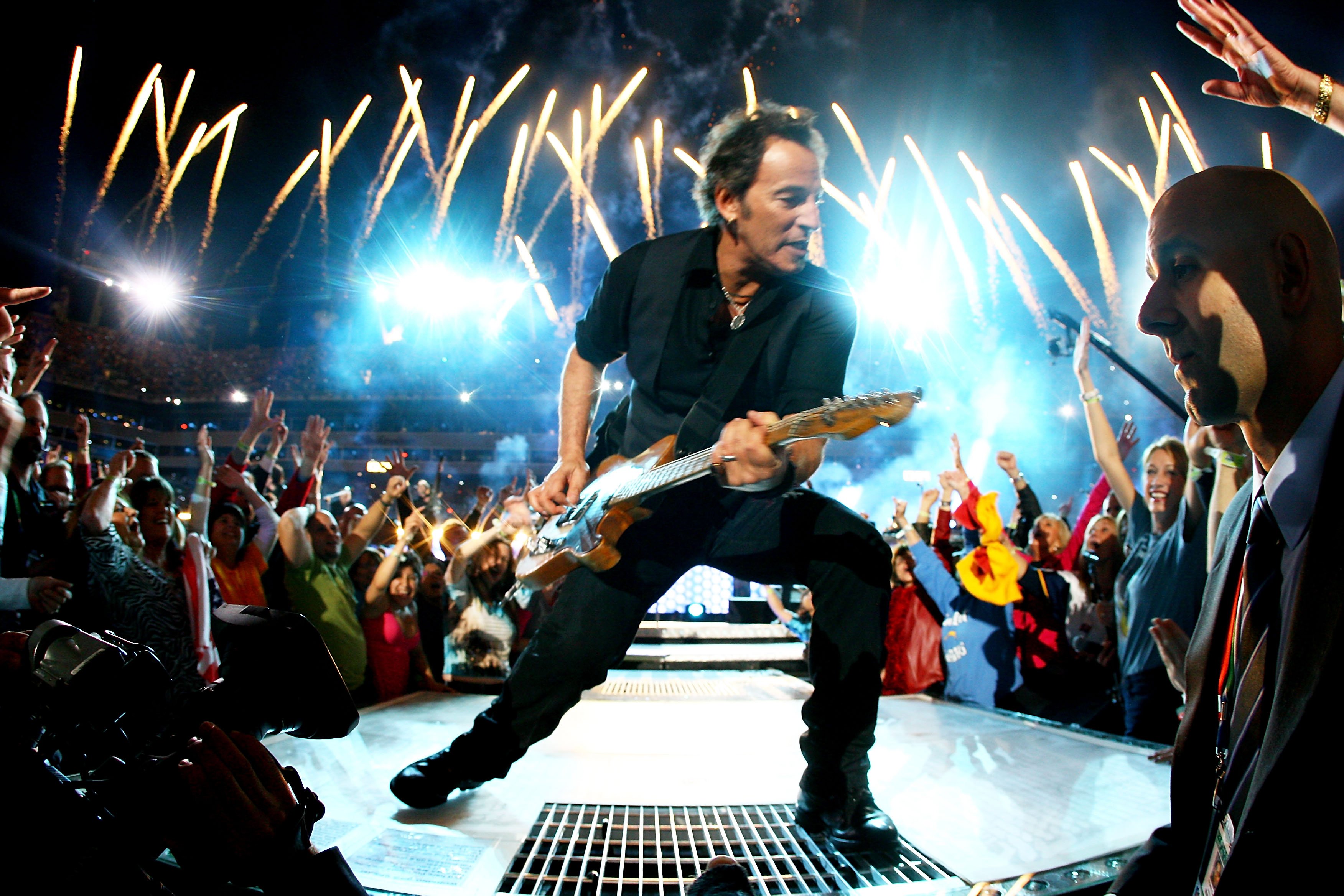 Musician Bruce Springsteen and the E Street Band perform at the Bridgestone halftime show during Super Bowl XLIII