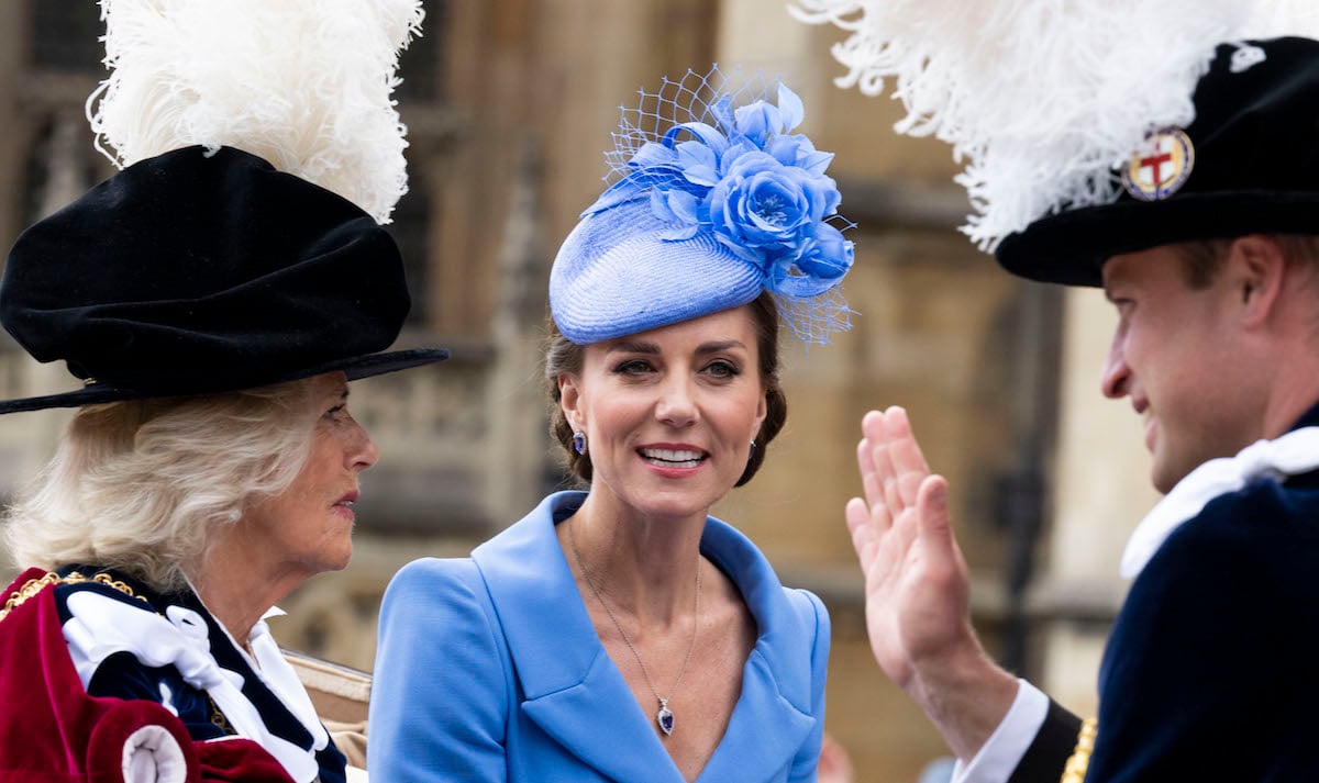 Camilla Parker Bowles, who said being photographed by Kate Middleton for Country Life Magazine was 'a lot of fun,' looks on as she sits next to Kate Middleton and Prince William