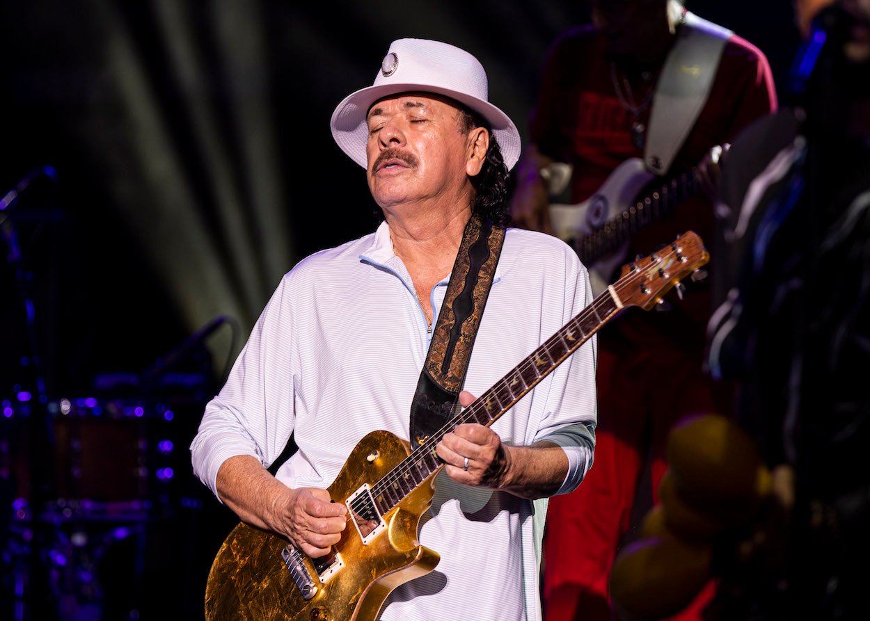 Carlos Santana performs at a July 5, 2022, concert at Pine Knob Music Theatre in Clarkston, Mich. Santana collapsed early in the set and was treated at a hospital, and it wasn't the guitarists first health scare.