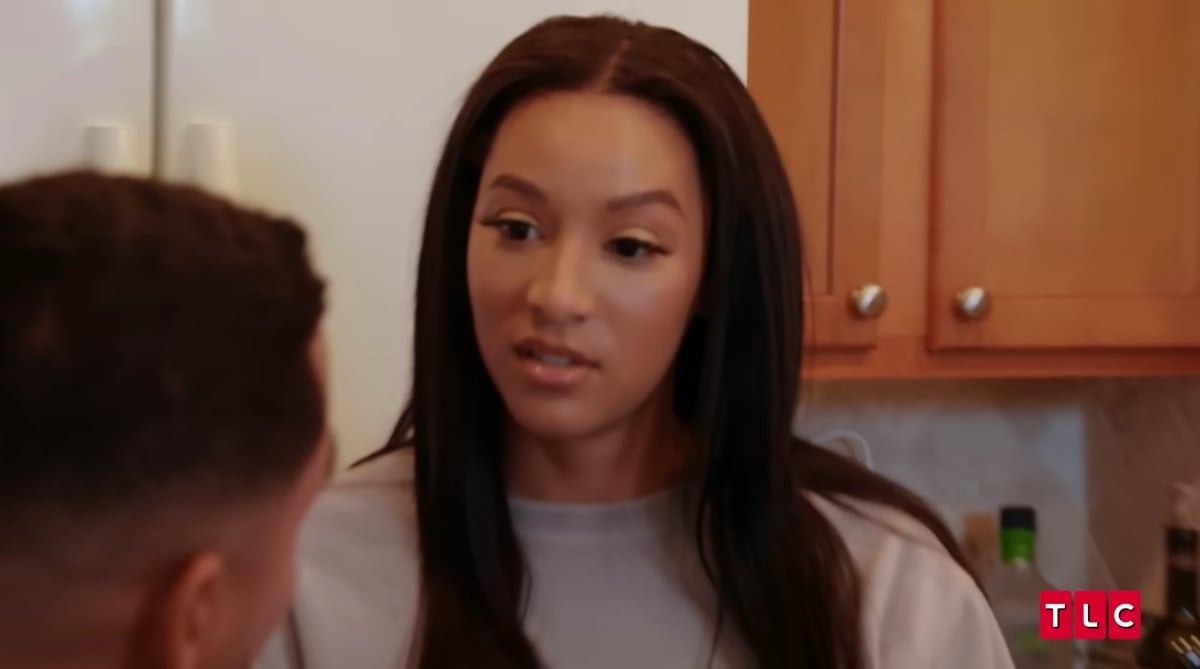 Chantel Everett looks at Pedro Jimeno in the kitchen of their home on 'The Family Chantel' Season 4.