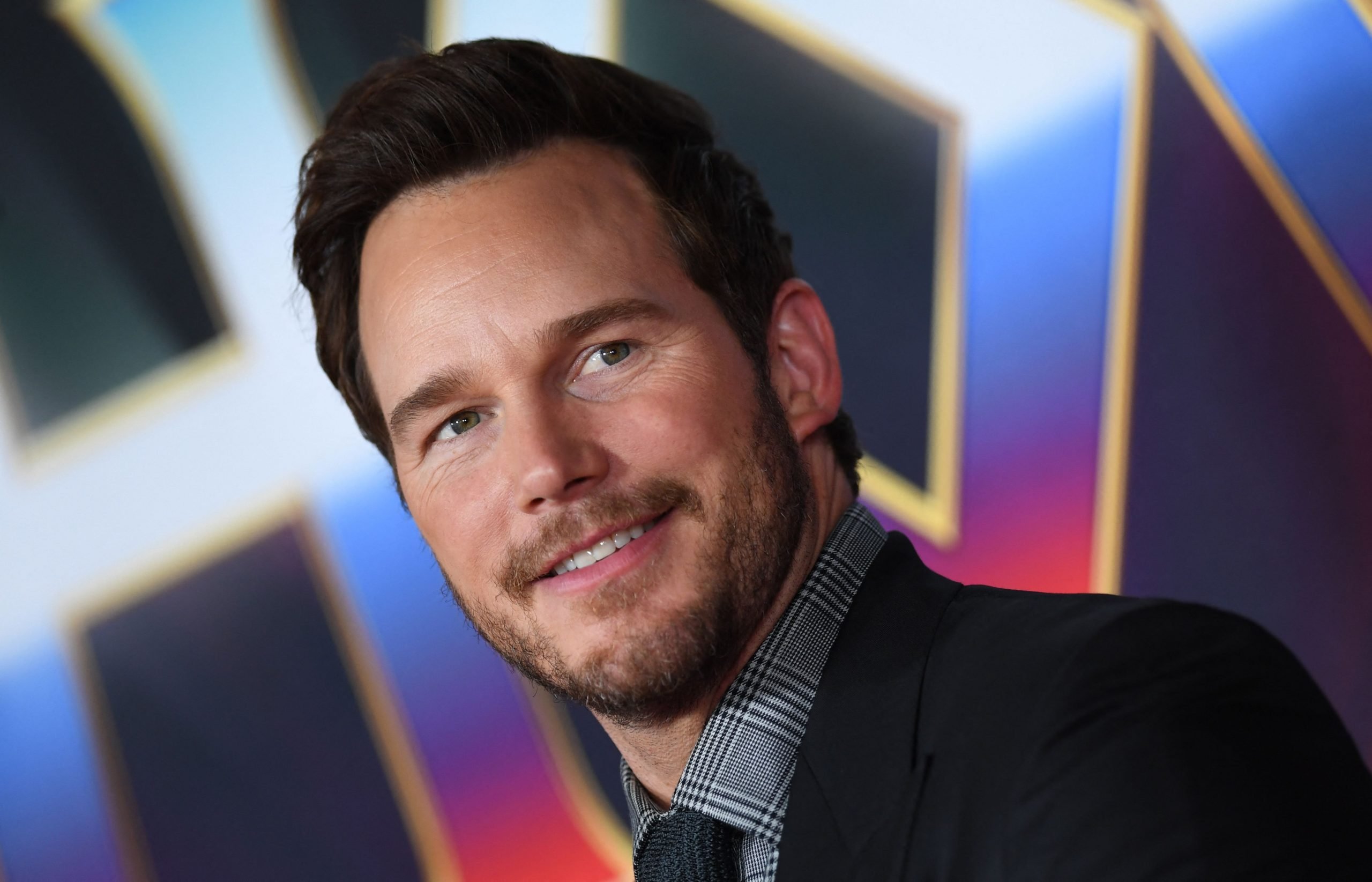 Chris Pratt, who almost played Indiana Jones, attends the premiere of Thor: Love and Thunder in Los Angeles