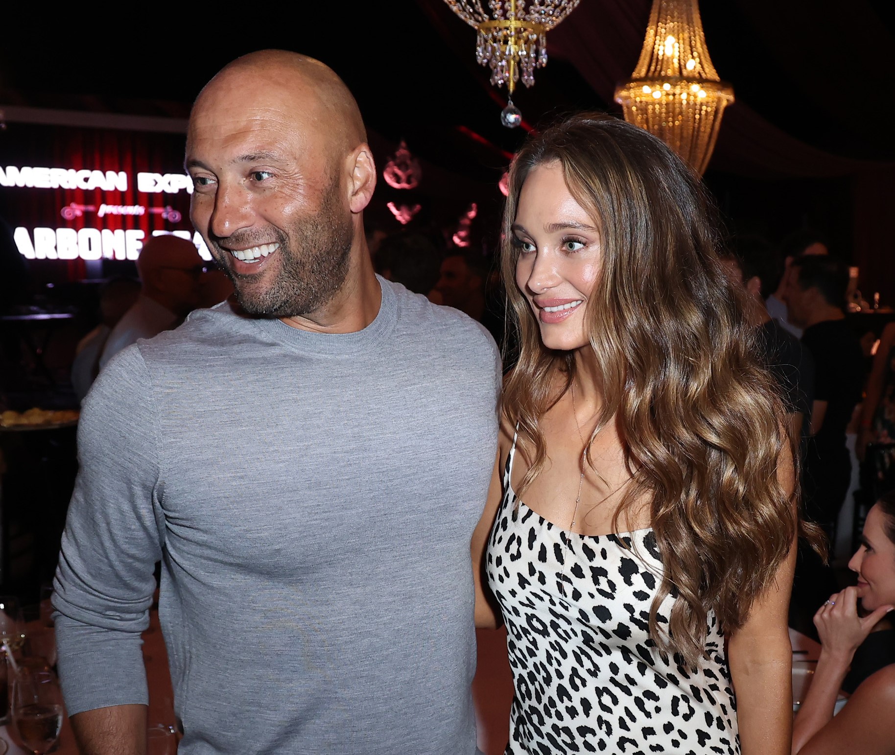 Derek Jeter and Hannah Davis Jeter, who has a her own impressive net worth, attend American Express Presents CARBONE Beach in Miami