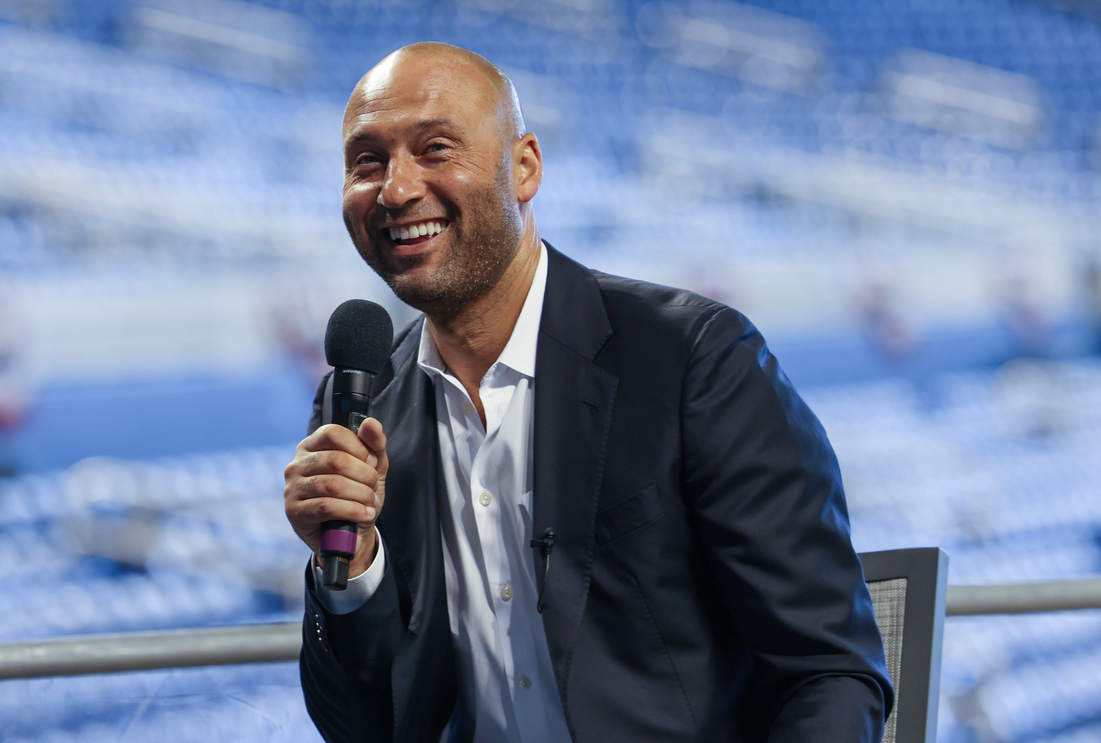 Derek Jeter, who own a few luxury houses, speaking to the media in Miami