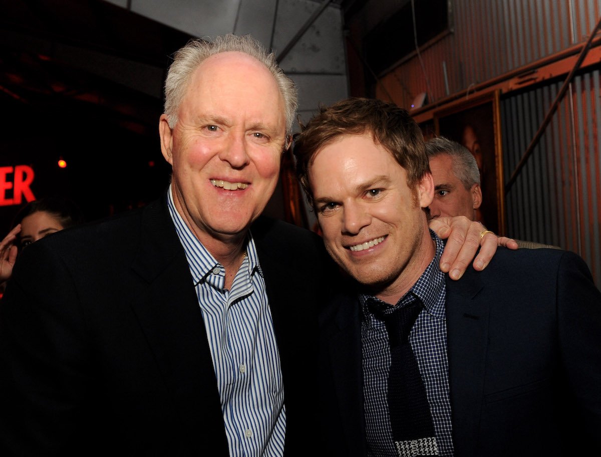 Actors John Lithgow and Michael C. Hall pose at the afterparty for the premiere screening of Dexter Season 8