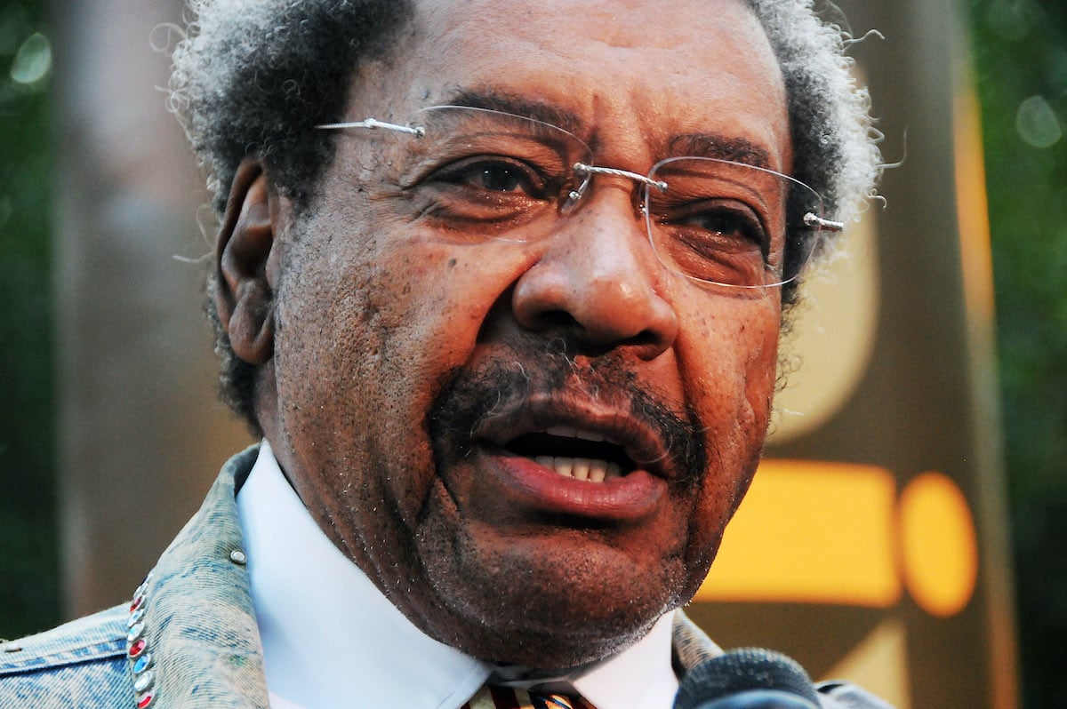 Don King in front of a blurred background
