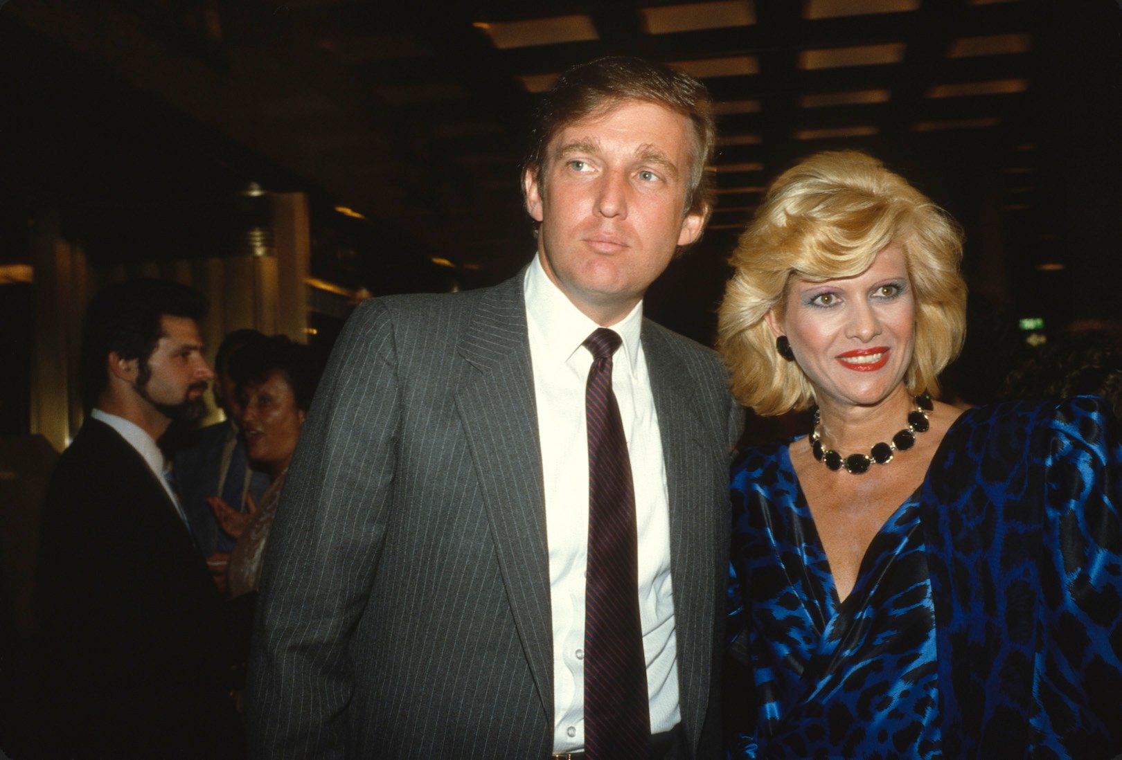 Ivana Trump and husband Donald Trump smiling together in 1984