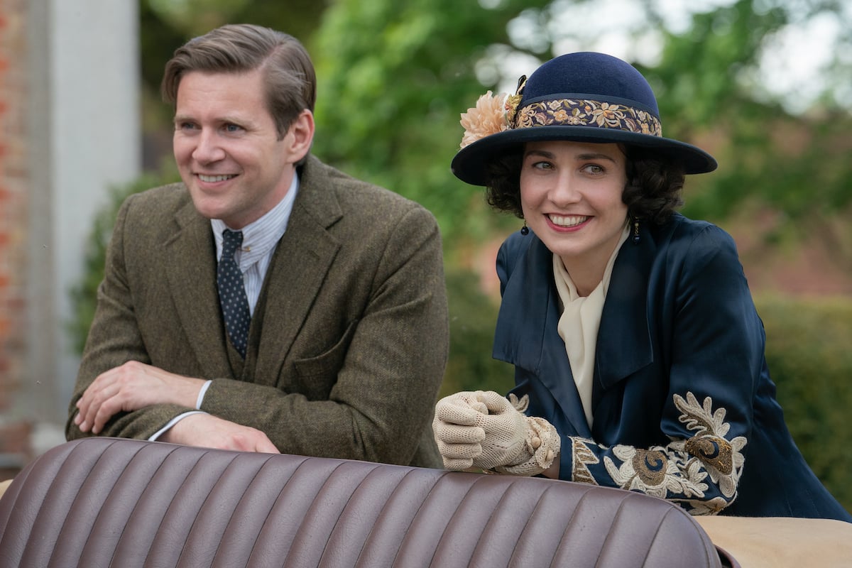 'Downton Abbey: A New Era': Tom Branson (Allen Leech) and Lucy Branson (Tuppence Middleton) lean on a car after their wedding