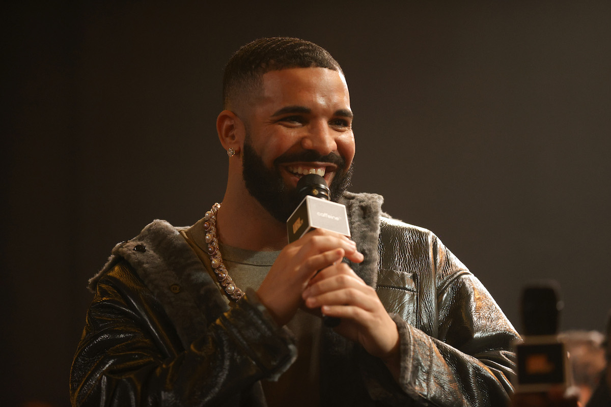 Drake speaking into a microphone