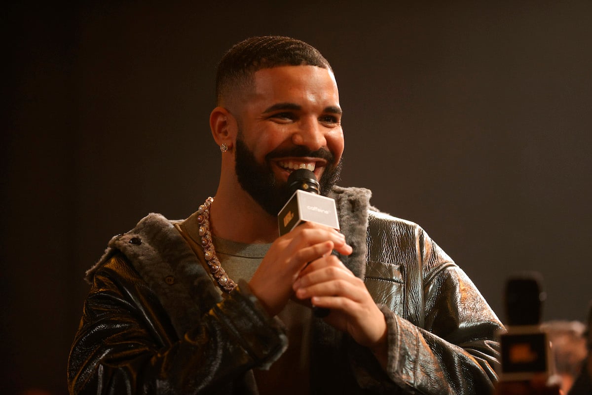 Drake speaking into a microphone