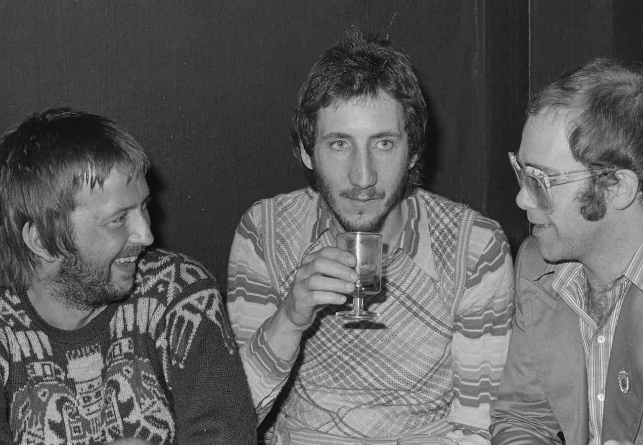 Eric Clapton, Pete Townshend, and Elton John at a party in 1974.