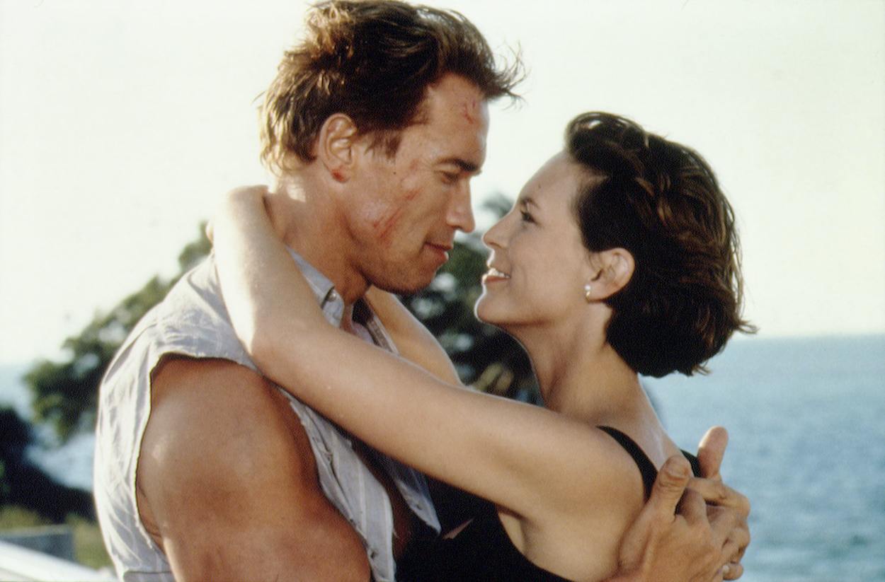 Arnold Schwarzenegger (left) and Jamie Lee Curtis in 'True Lies.' The James Cameron-directed movie is one of the essential Schwarzenegger movies.