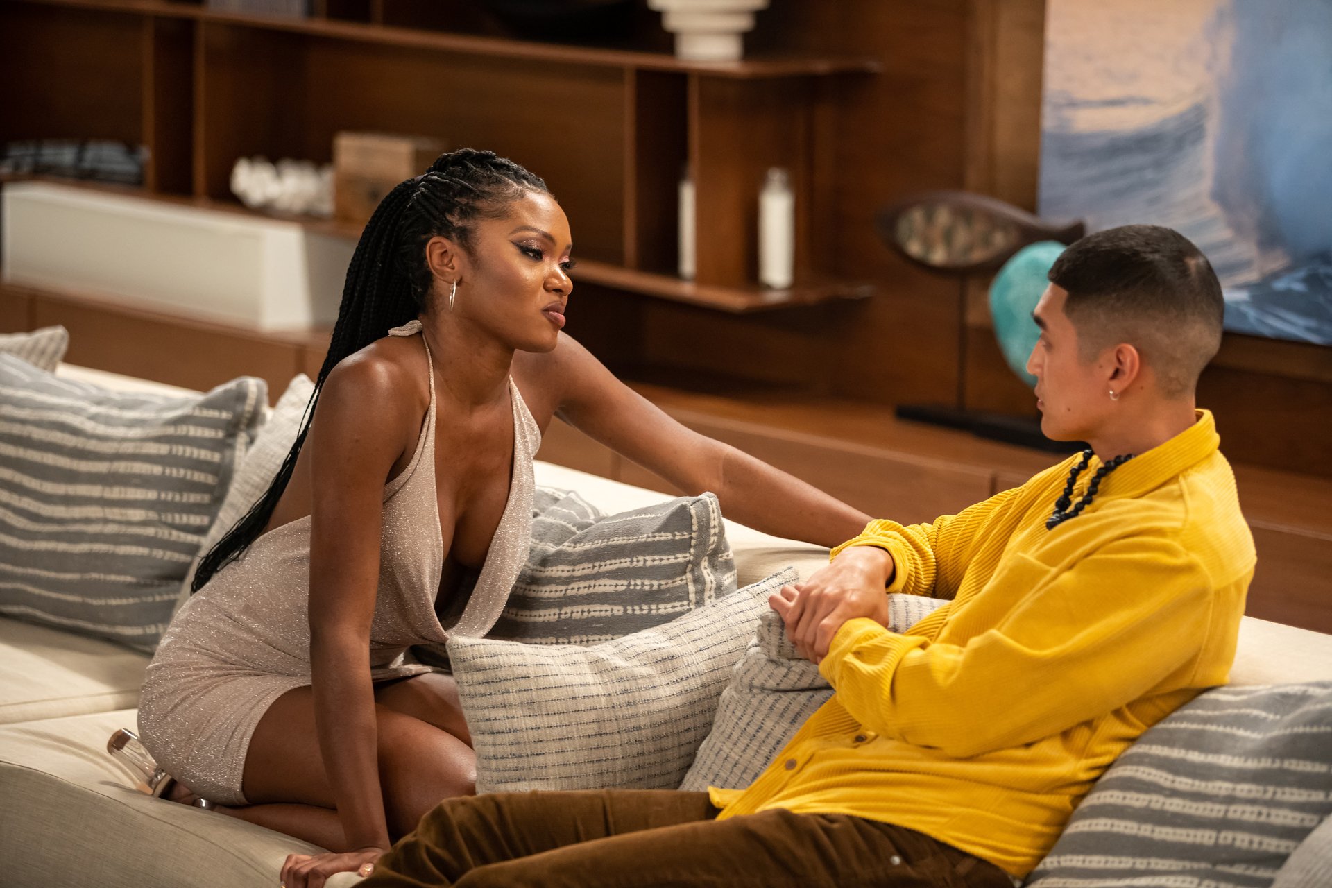 'FBoy Island' Season 2 Mia Emani Jones and Peter Park sit together on a couch.