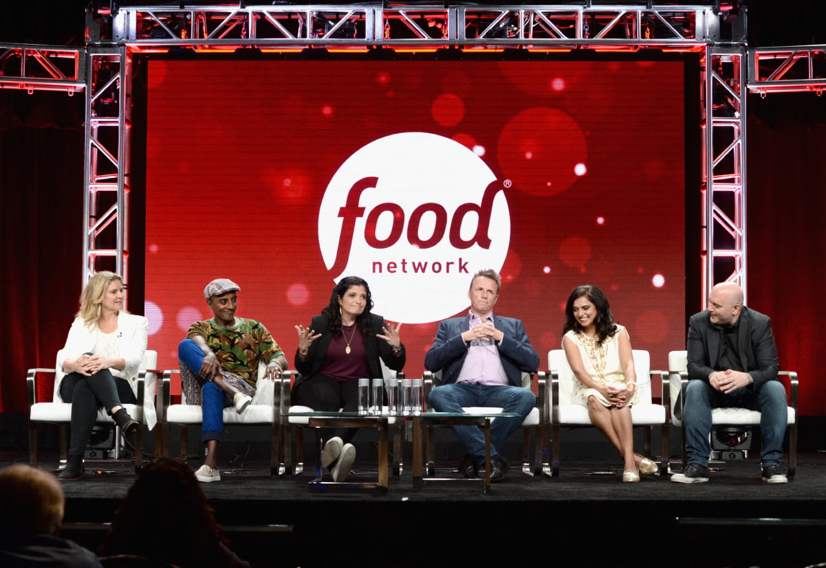 Food Network chefs take part in an on-stage chat in 2018.