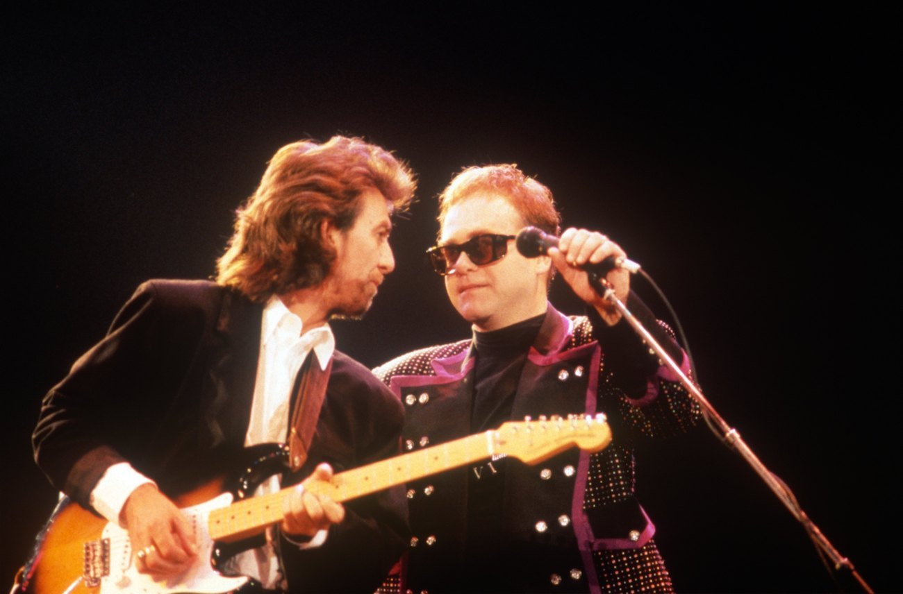 George Harrison and Elton John performing together at the Prince's Trust Concert in 1987.
