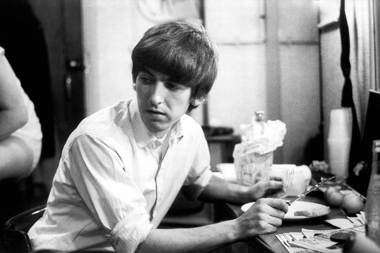 George Harrison backstage with The Beatles during their 1963 Christmas show.