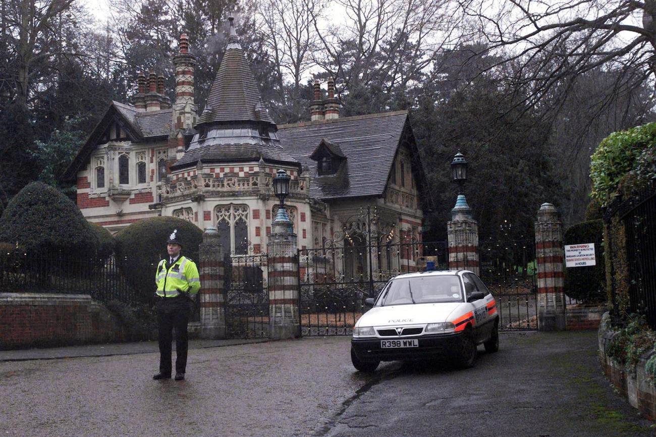 The front gates of Friar Park following George Harrison's 1999 home invasion.