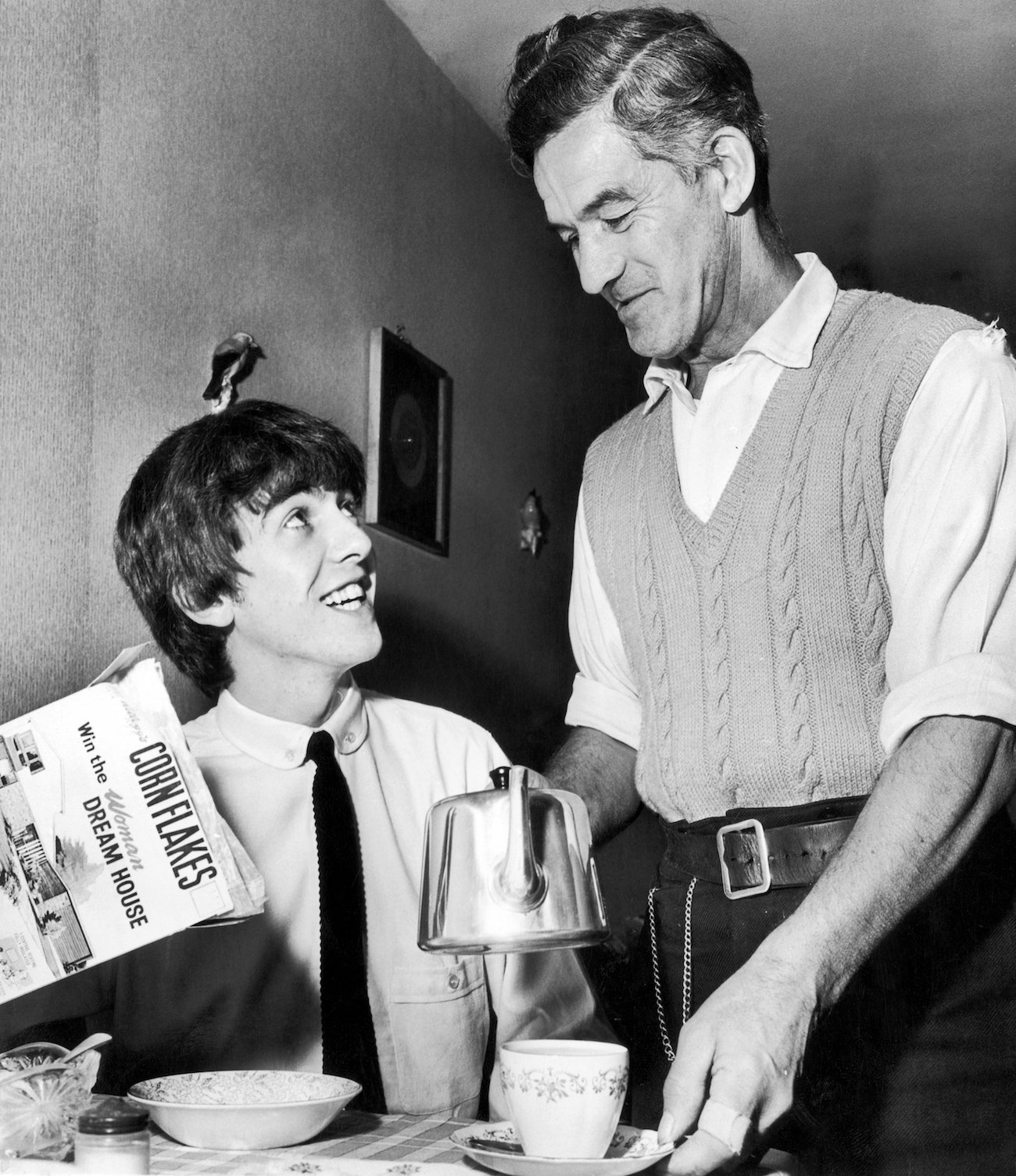 George Harrison's dad Harold pouring him tea in 1963.