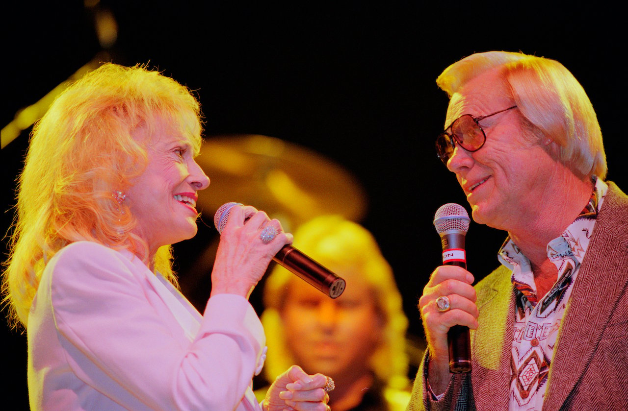 George Jones, pictured performing with Tammy Wynette in 1995, was accused by some of being involved in her kidnapping